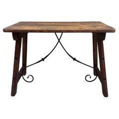 Early 20th Century Spanish Table with Wrought Iron Cross Stretchers