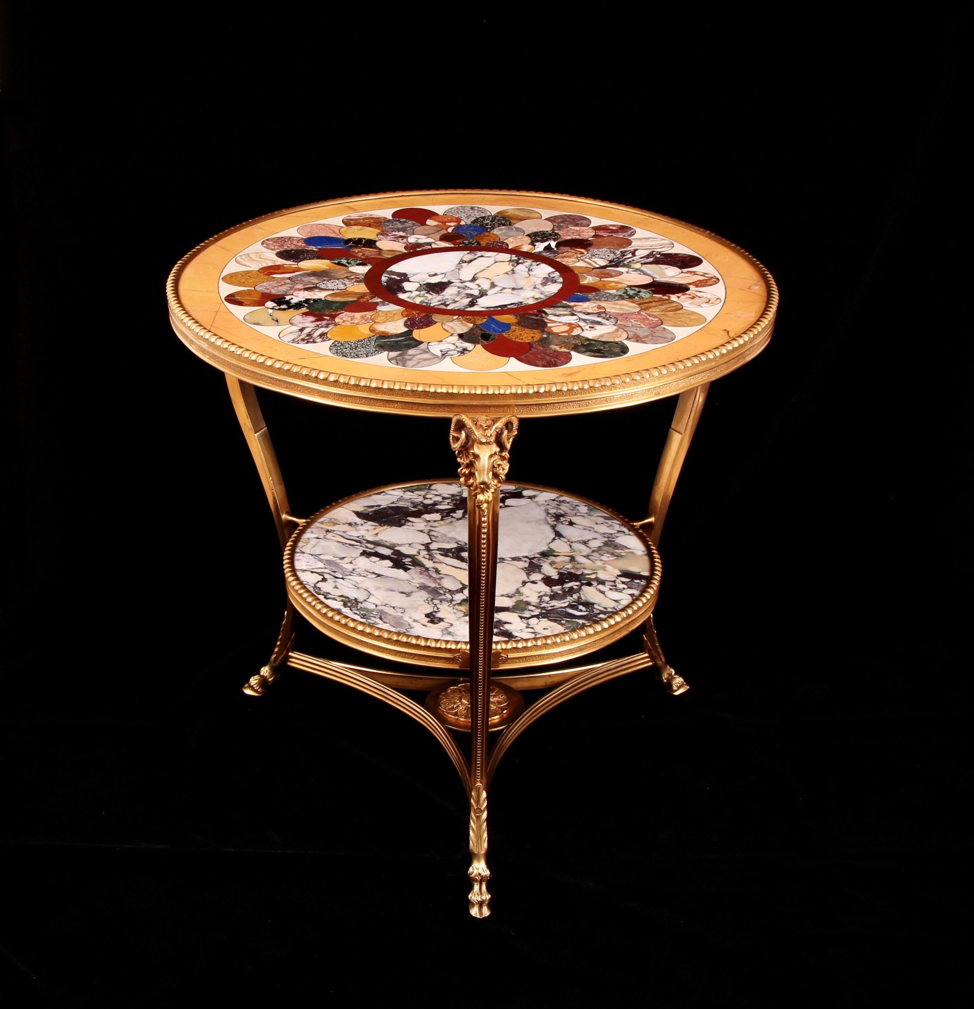An early 20th century neoclassical masterpiece

Incorporating some of the World’s absolute rarest and most beautiful stones.

Rare early 20th century specimen marble & semi precious stone gilt bronze Centre Table / Gueridon. The rarity of the