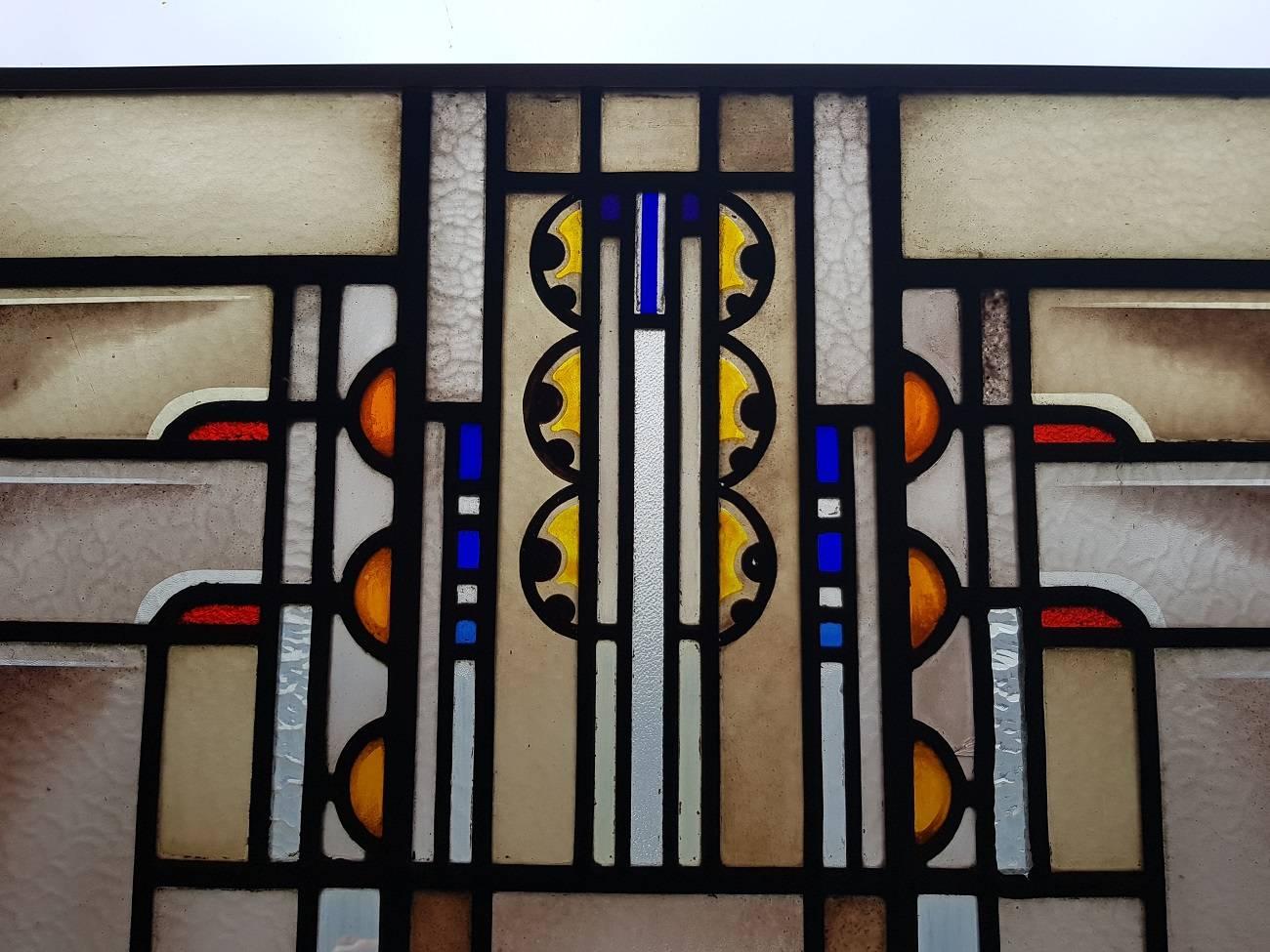 Beautiful Amsterdam school art painted stained glass window from, circa 1920-1930 and its in a perfect condition.

The measurements are,
Depth 1 cm/ 0.3 inch.
Width 92 cm/ 36.2 inch.
Height 64.5 cm/ 25.3 inch.
      