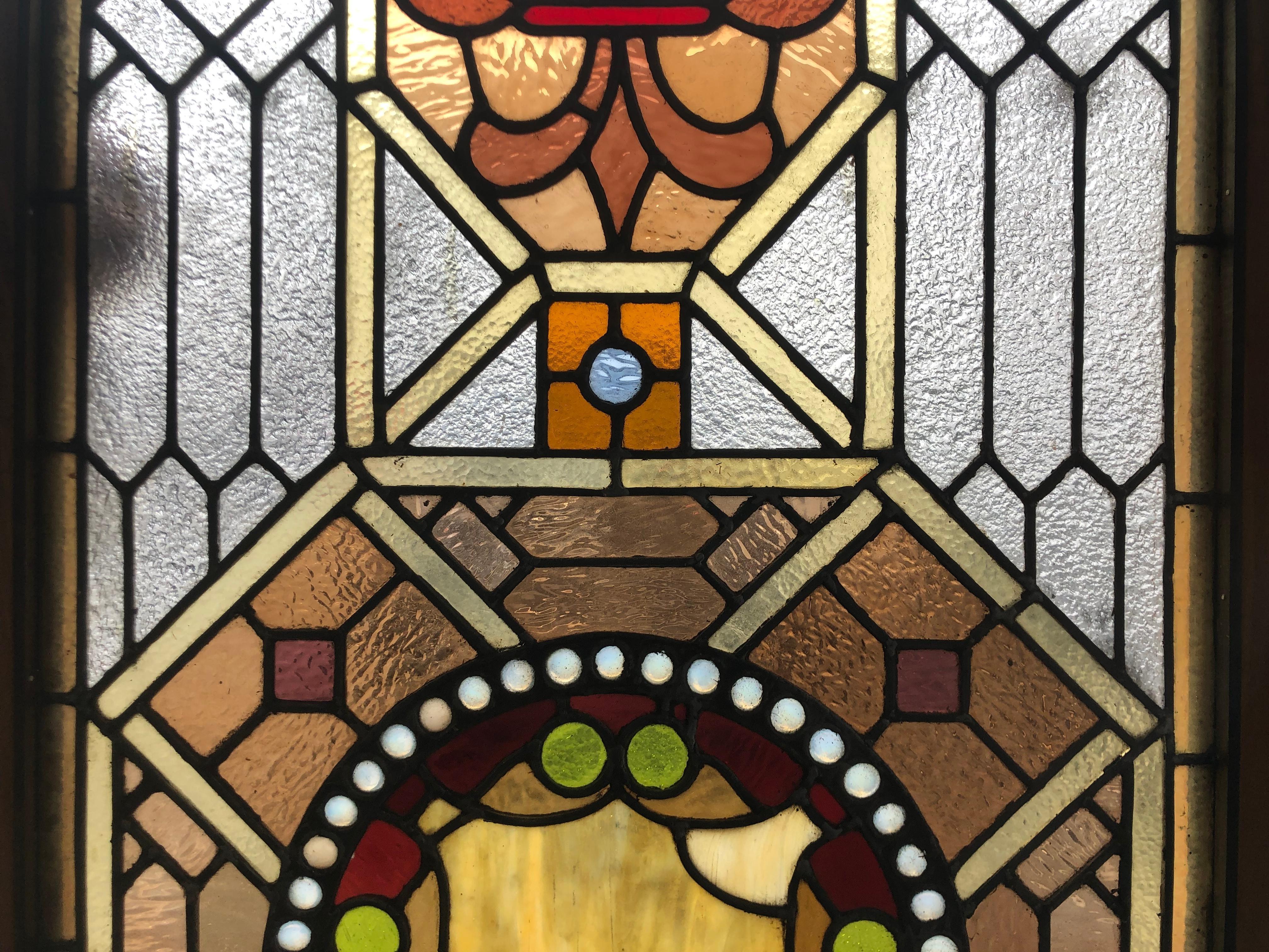 stained glass in wood frame