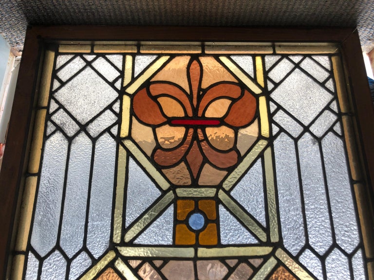 Early 20th Century Stained Glass Window in a Wood Frame For Sale at