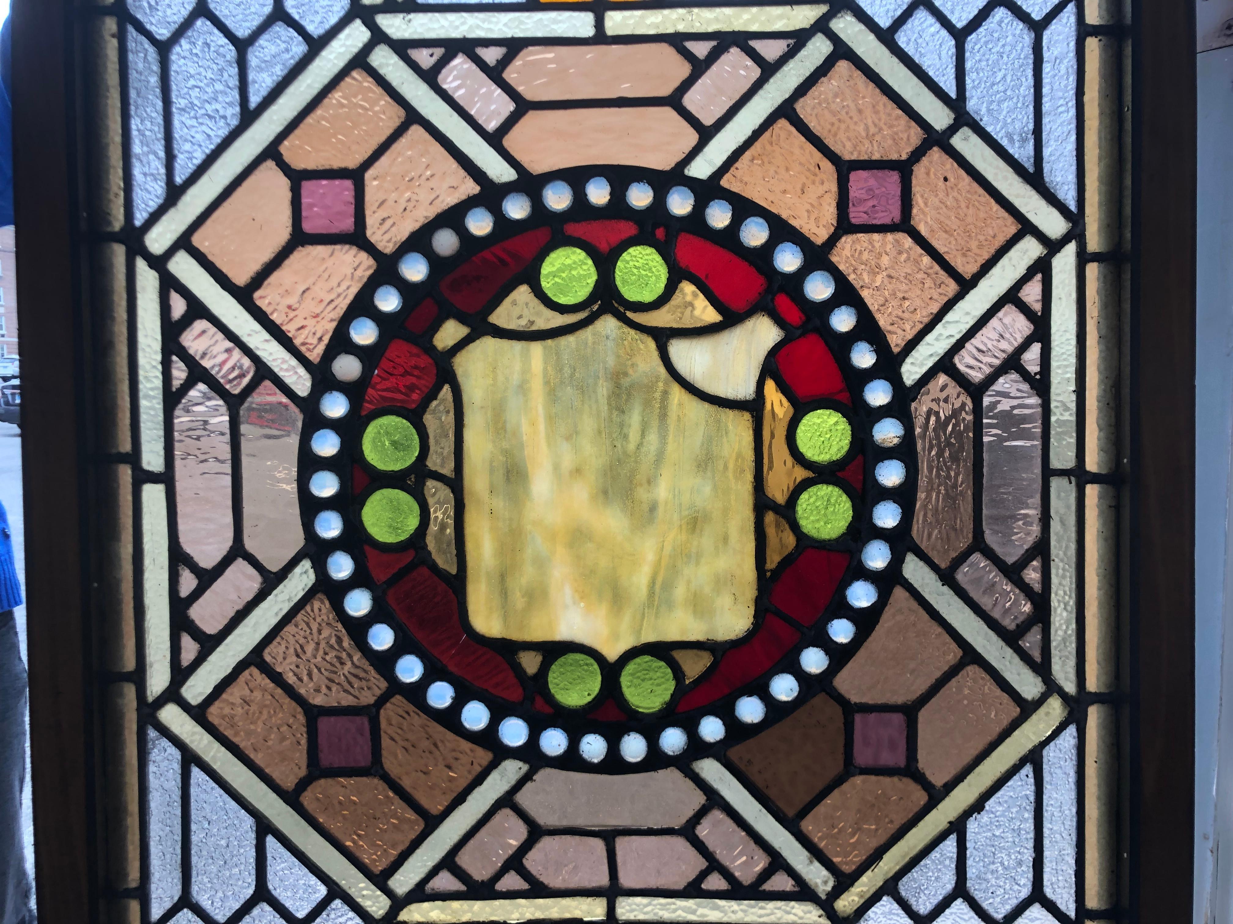 American Early 20th Century Stained Glass Window in a Wood Frame For Sale