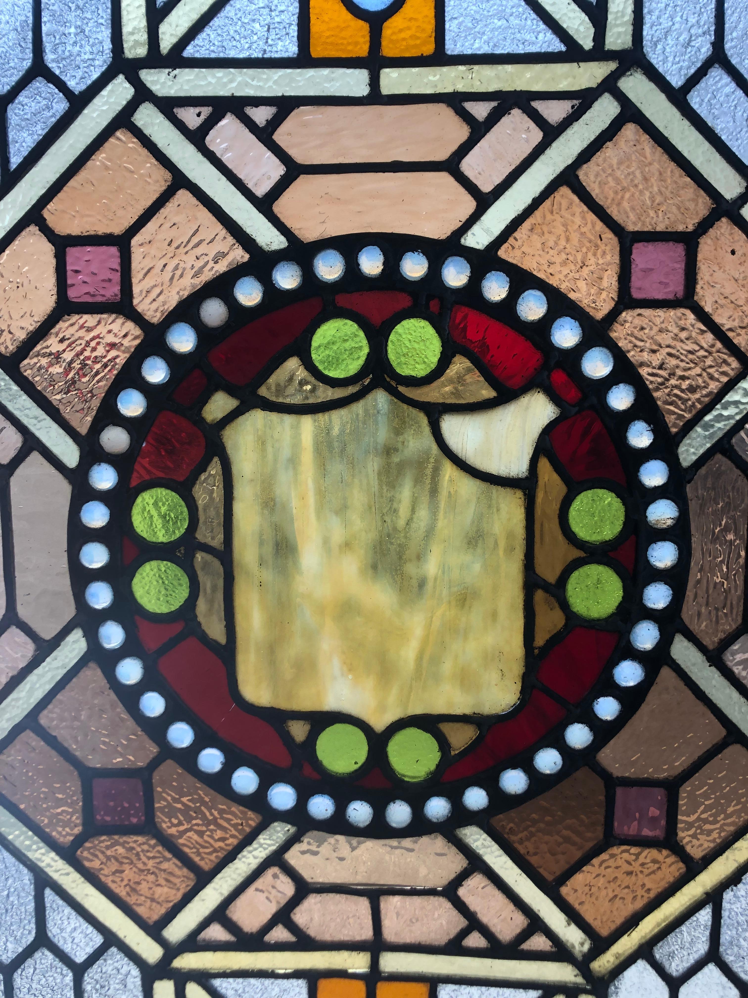Hand-Crafted Early 20th Century Stained Glass Window in a Wood Frame For Sale