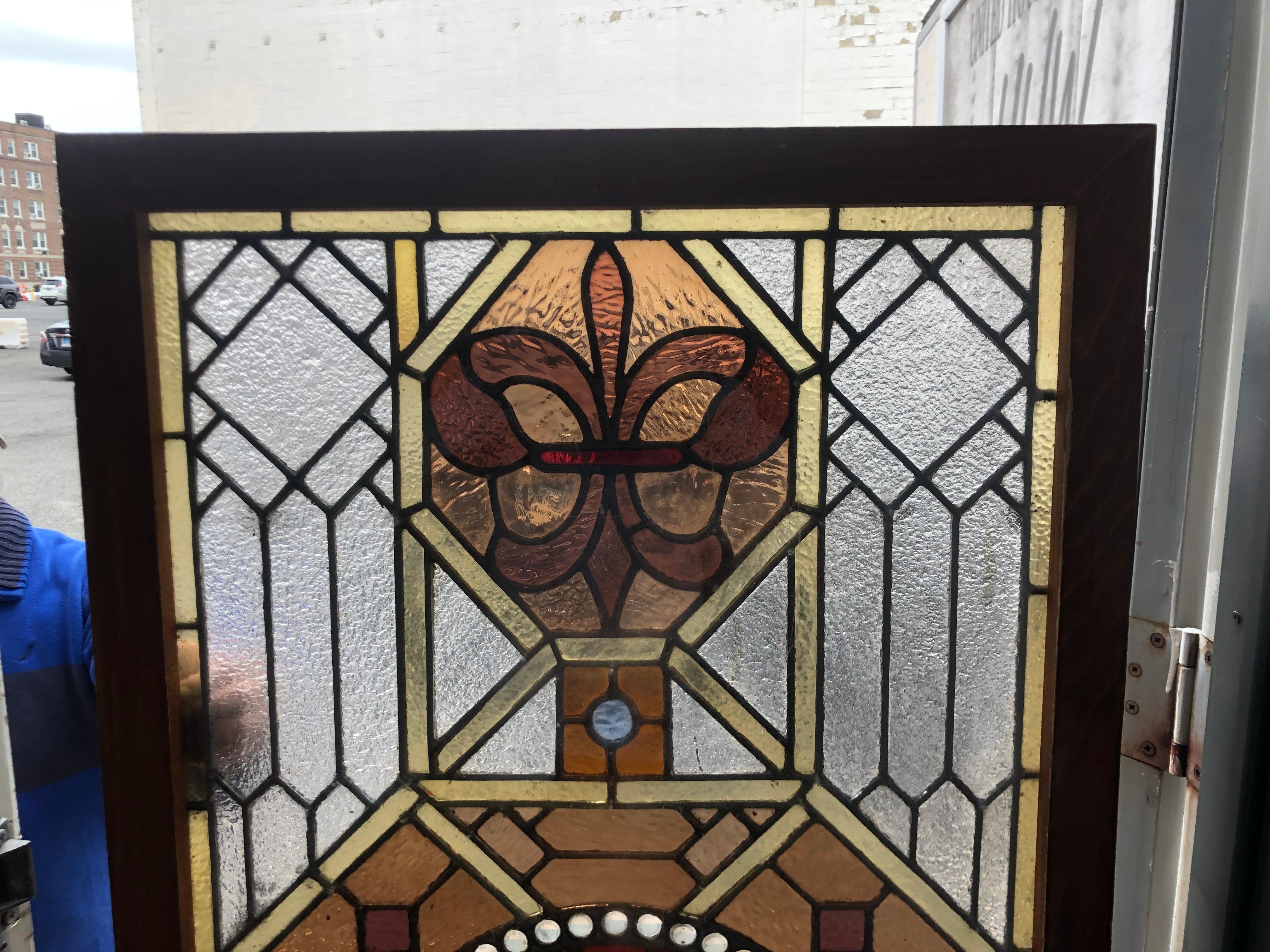 Early 20th Century Stained Glass Window in a Wood Frame For Sale 1