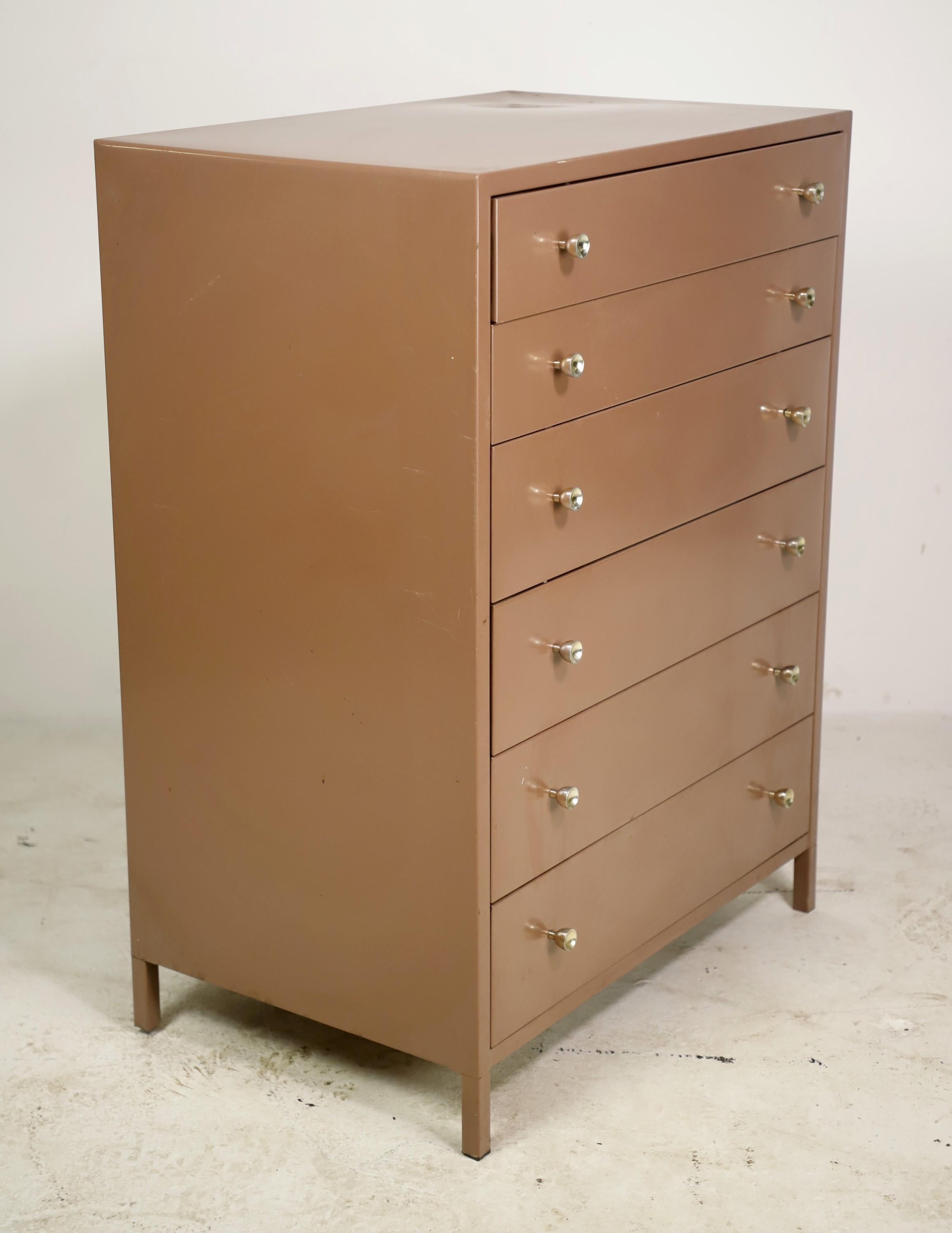 Beige painted vintage dresser made of steel with six drawers and nickel drawer pulls. This is in great condition. Please note, this item is located in our Scranton, PA location.