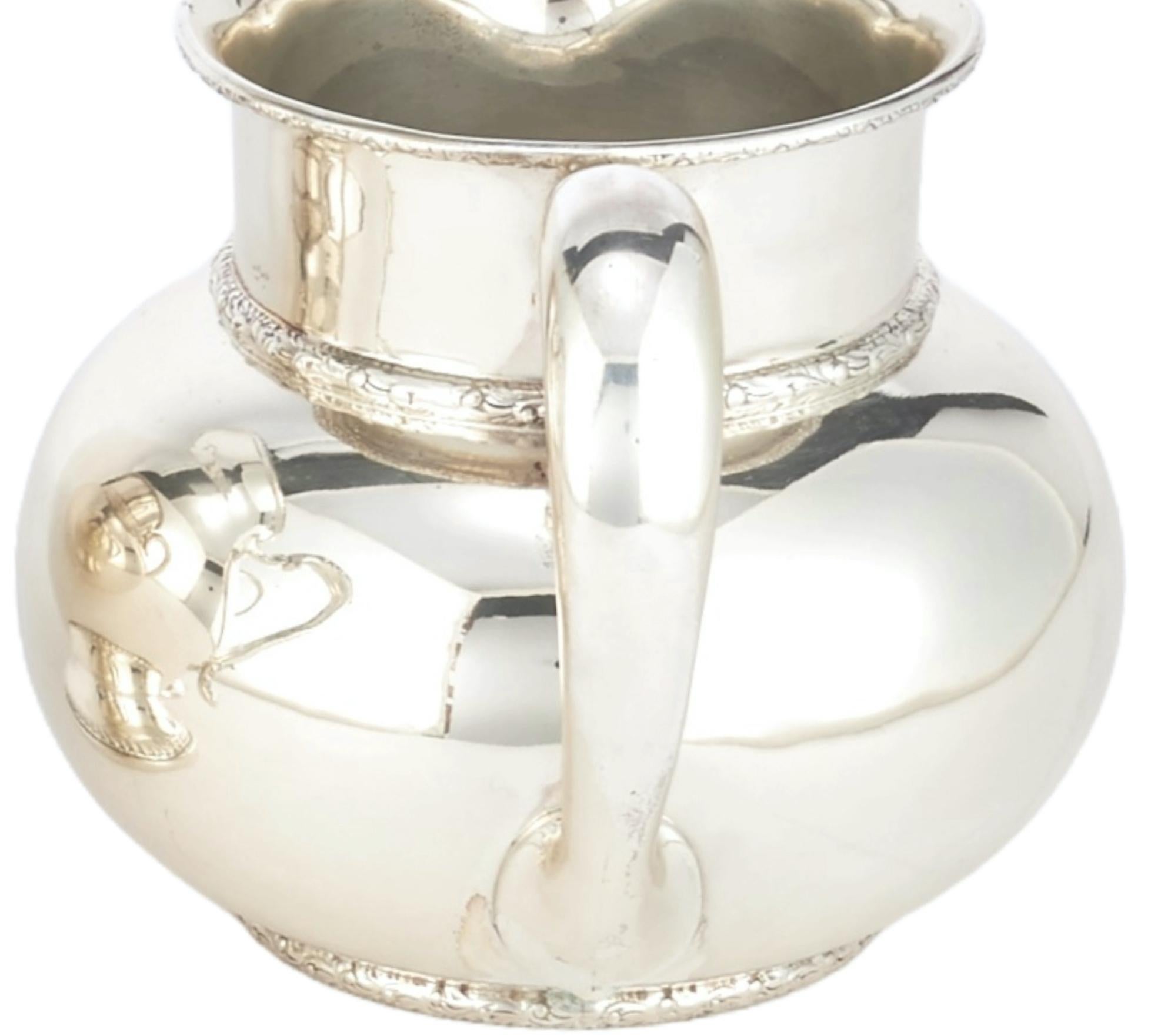 Américain Début du 20ème siècle A Silver Tableware Serveware Pitcher en vente