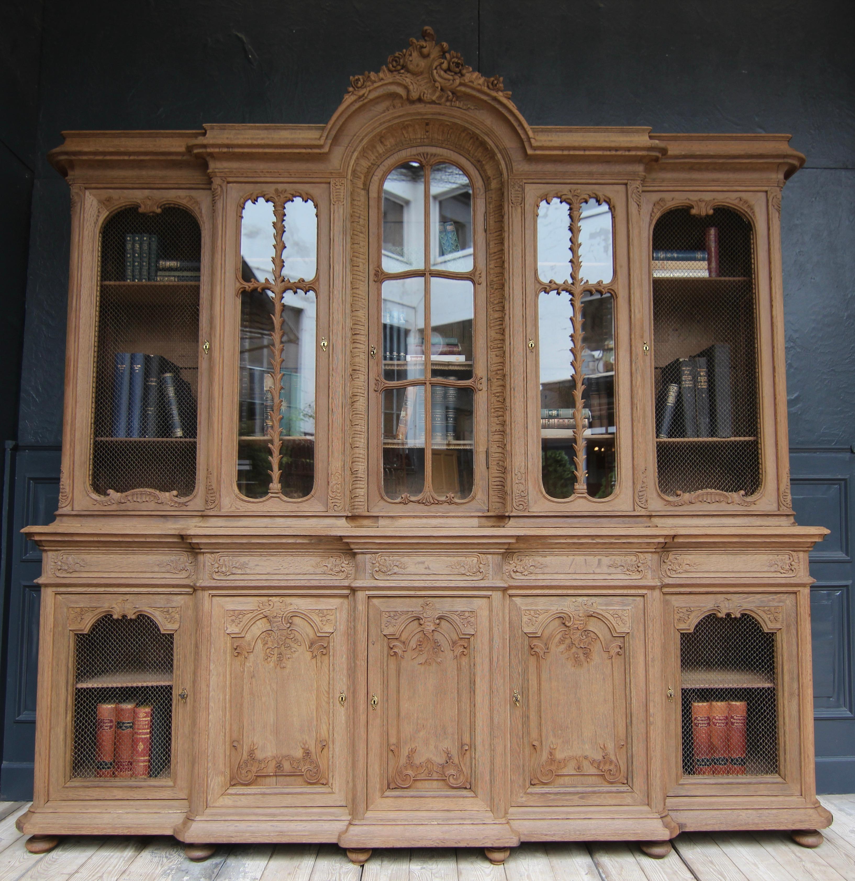 Rococo Revival Early 20th Century Stripped Oak Bookcase For Sale