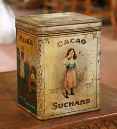 Scatola pubblicitaria in latta litografata Suchard per il cacao, dei primi anni del XX secolo
