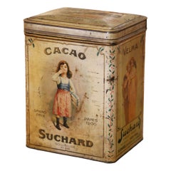 Scatola pubblicitaria in latta litografata Suchard per il cacao, dei primi anni del XX secolo