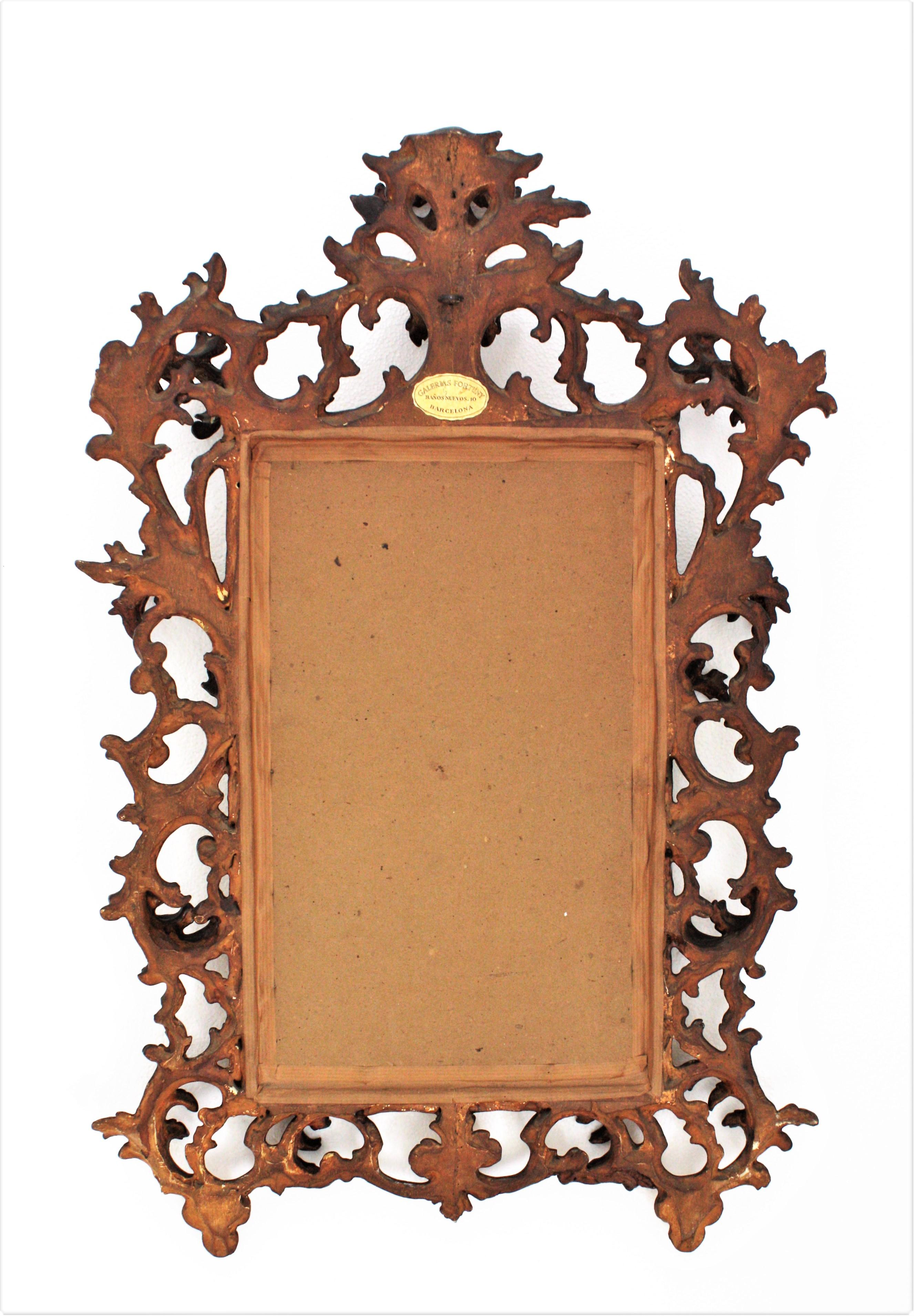 Early 20th Century Carved Giltwood Rococo Mirror with Crest For Sale 5