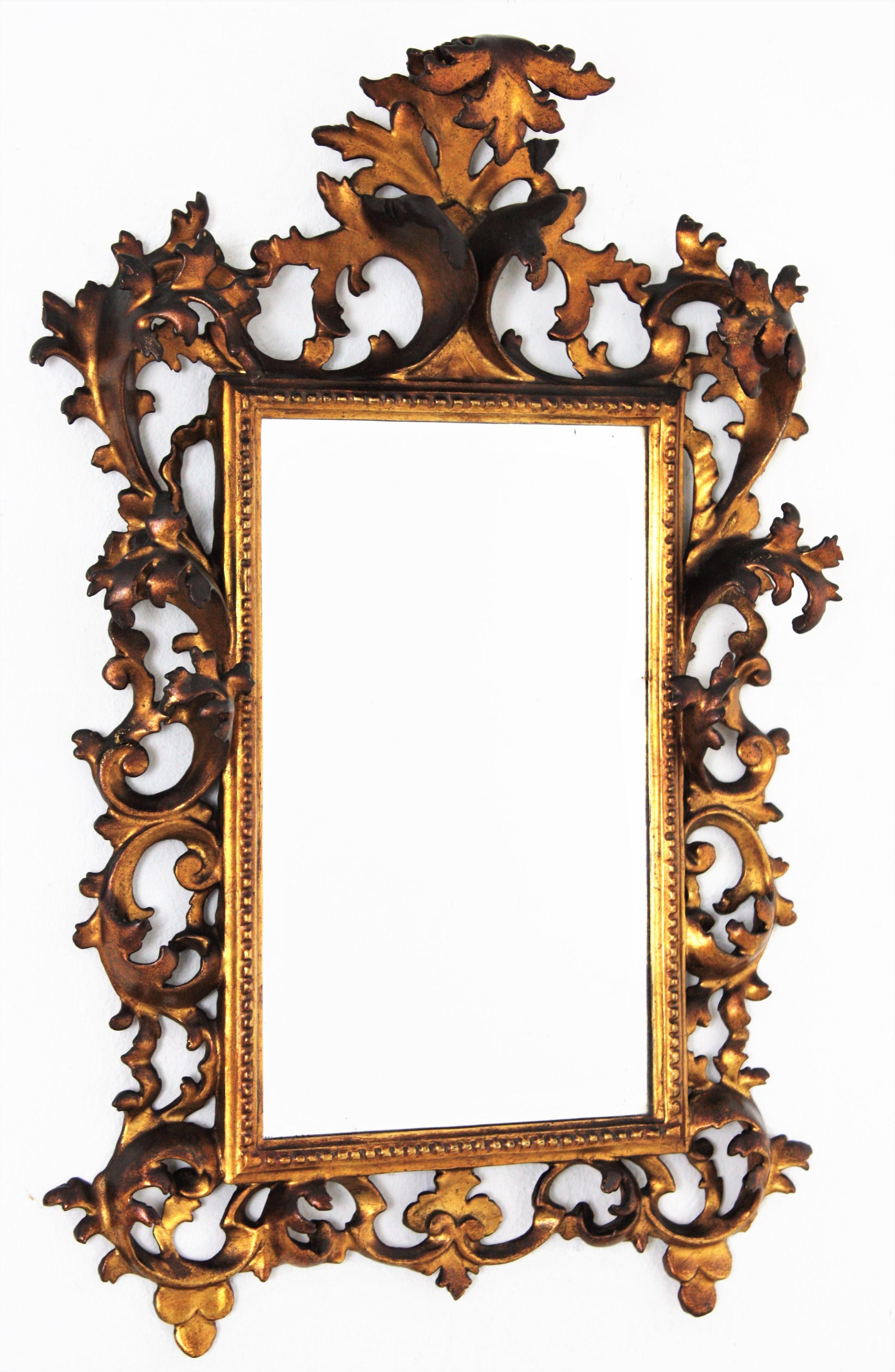 Rococo Revival Early 20th Century Carved Giltwood Rococo Mirror with Crest For Sale