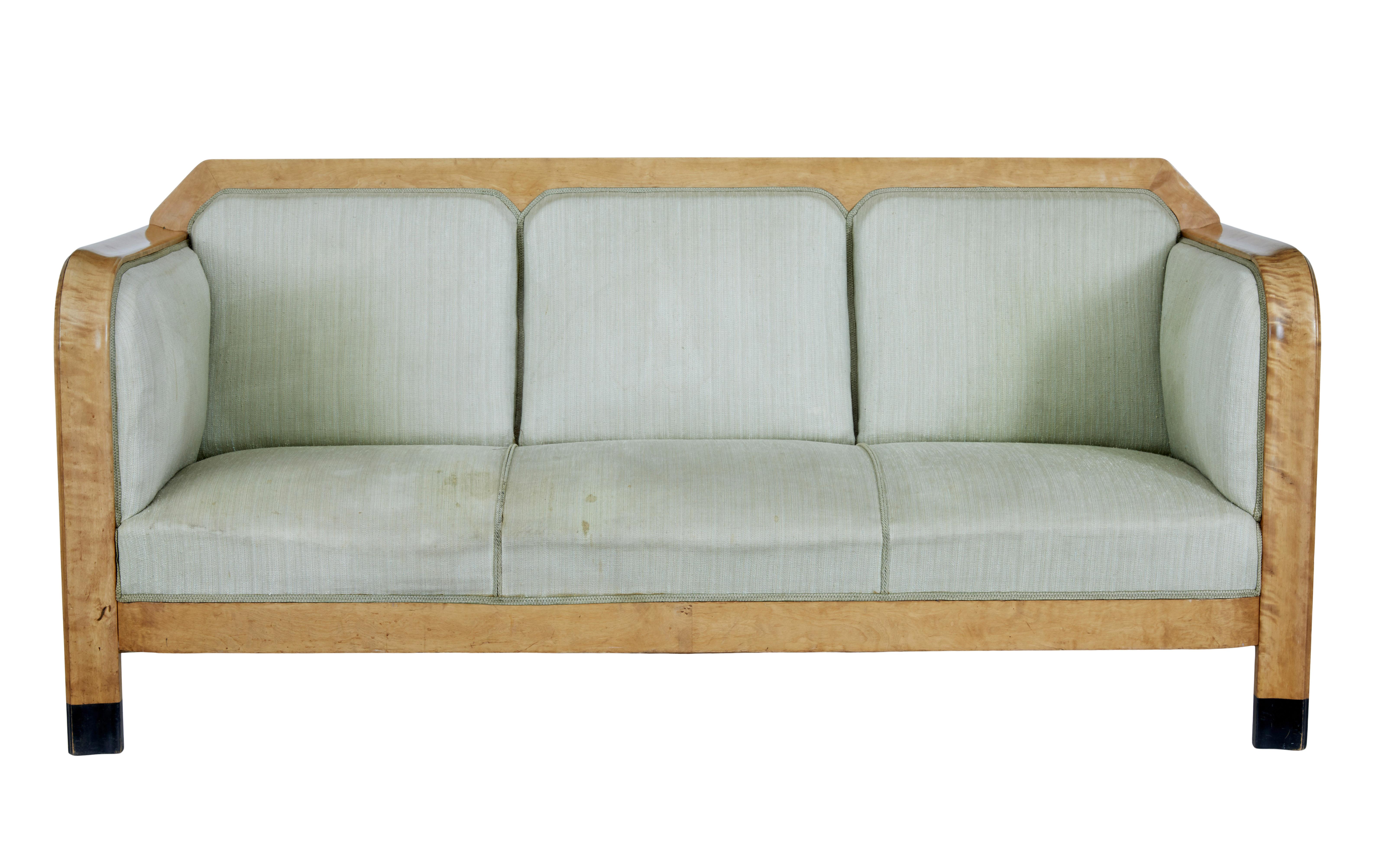 Early 20th century Swedish birch sofa, circa 1900.

Large proportioned comfortable 3 seater sofa. Flowing arms with straight solid sides. Upholstery shaped to form 3 seats. Ebonised tips to from legs.

Very comfortable sofa, which is need of