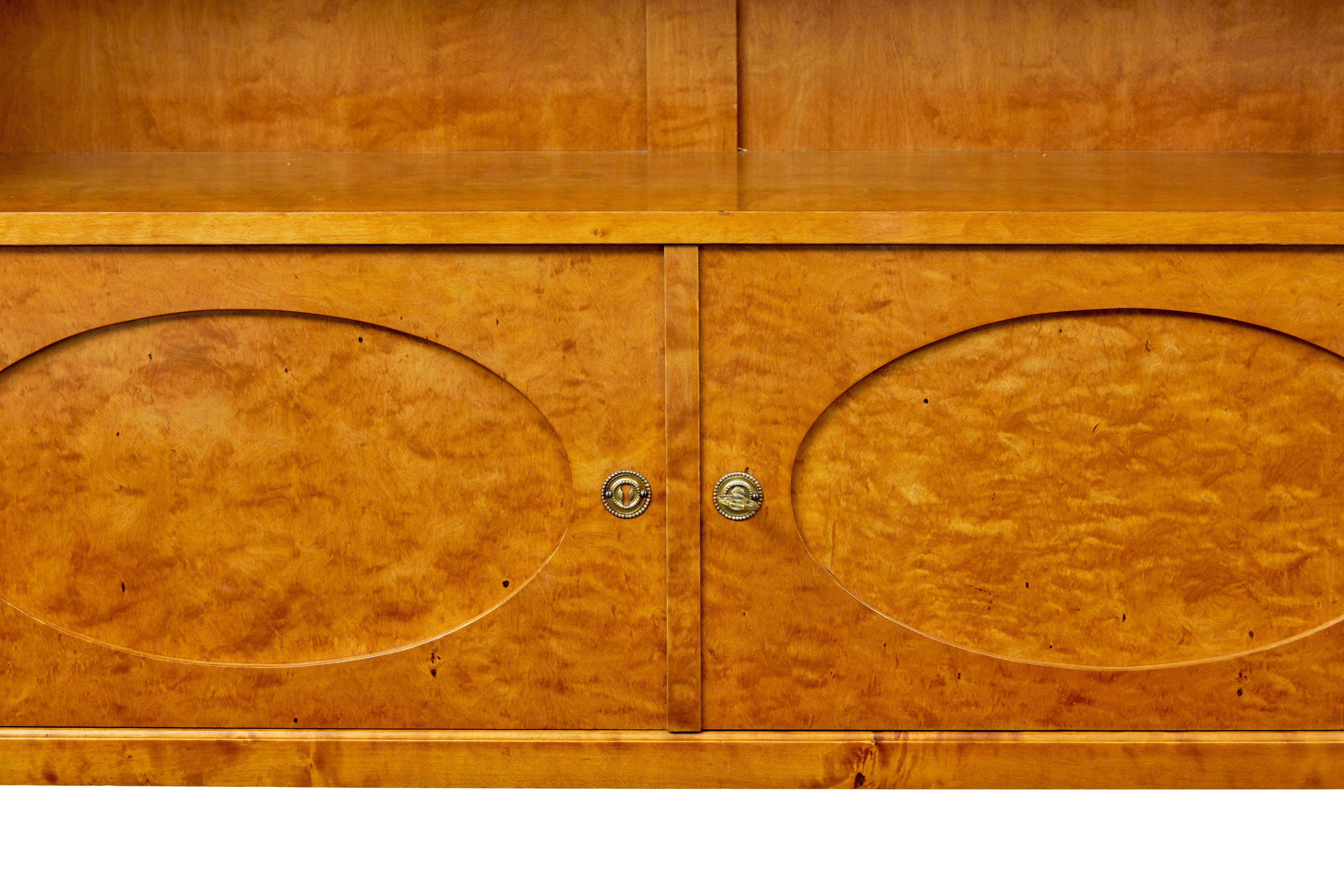 Glass Early 20th century Swedish bookcase cabinet by Sandberg & Co For Sale