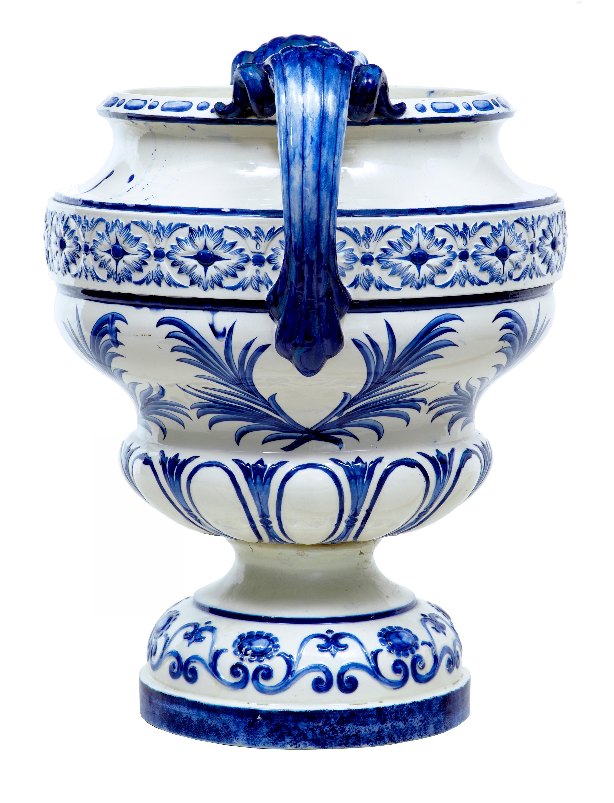 Early 20th century Swedish ceramic urn by Rorstrand, circa 1901.

Large blue and white urn by the reknowned maker Rorstrand stamped 1901. Rorstrand are a Swedish company that have been making fine quality porcelain and pottery since 1726 and still