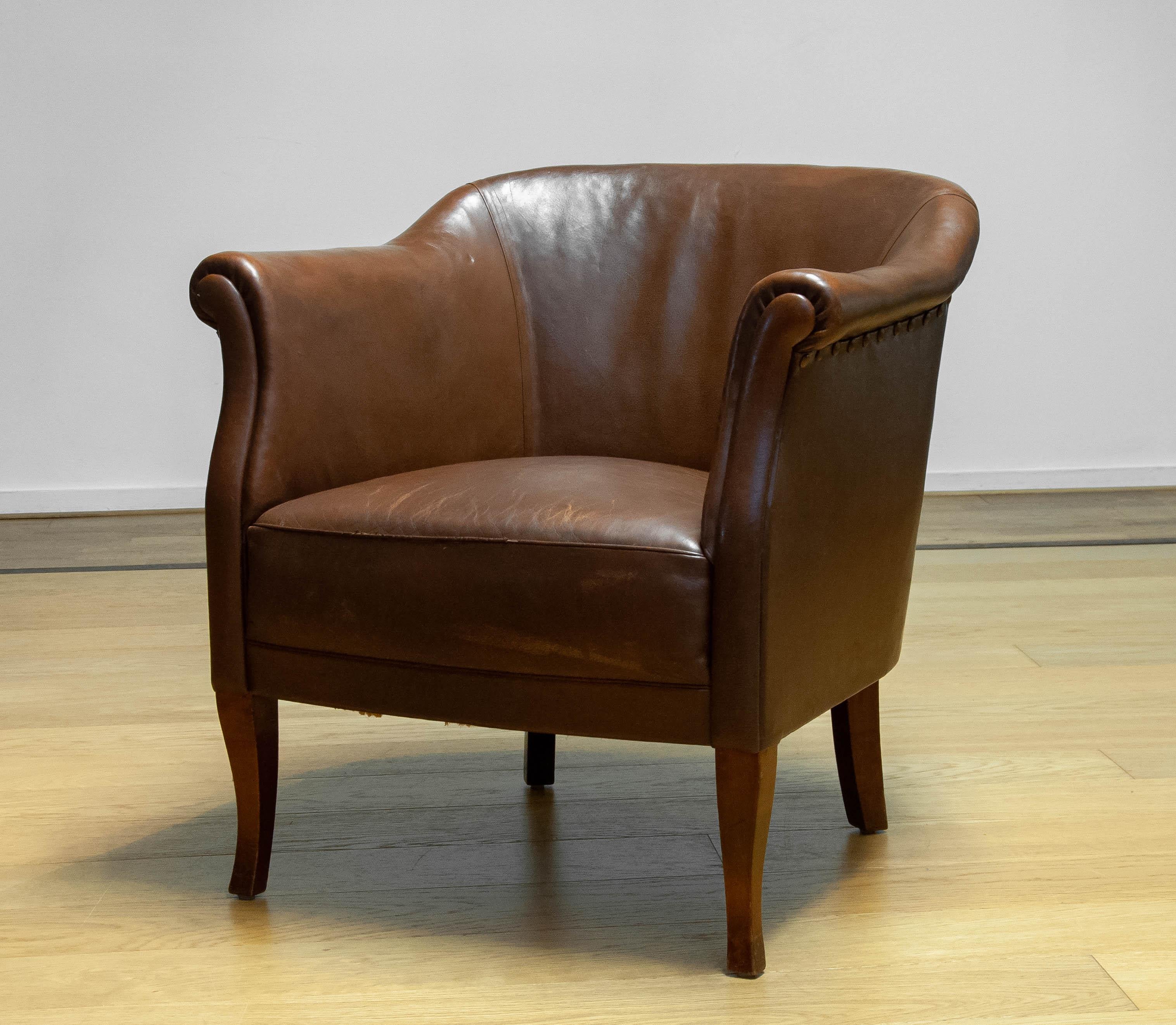 Absolutely unique and stunning authentic and original club / lounge / cigar chair from early 20th century made in Sweden.
The great vintage / antique patina on the leather gives the chair her absolutely unique and beautiful appearance and makes this