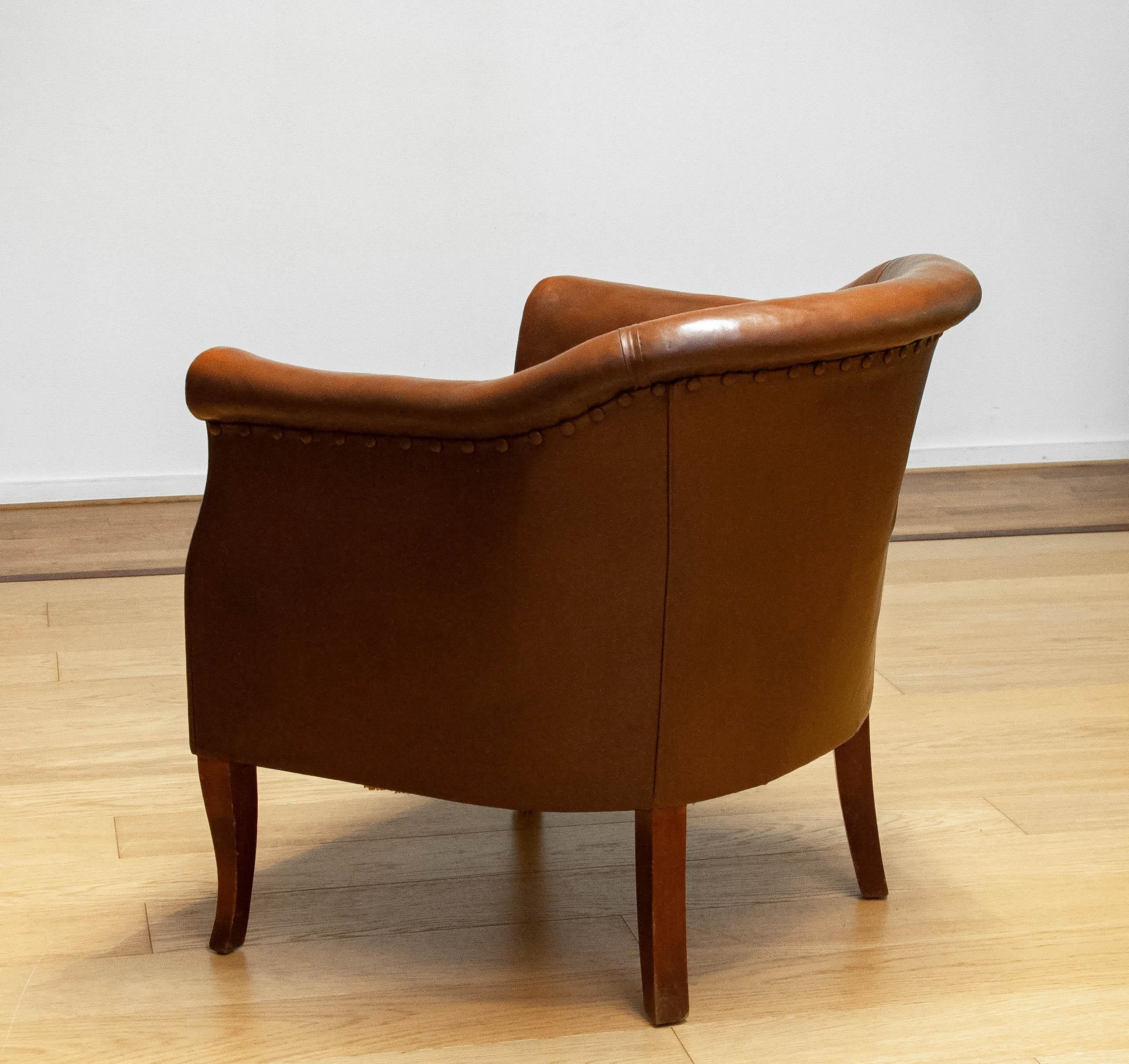Late 19th Century Early 20th Century Swedish Tan Brown Nailed Leather Lounge / Club / Cigar Chair