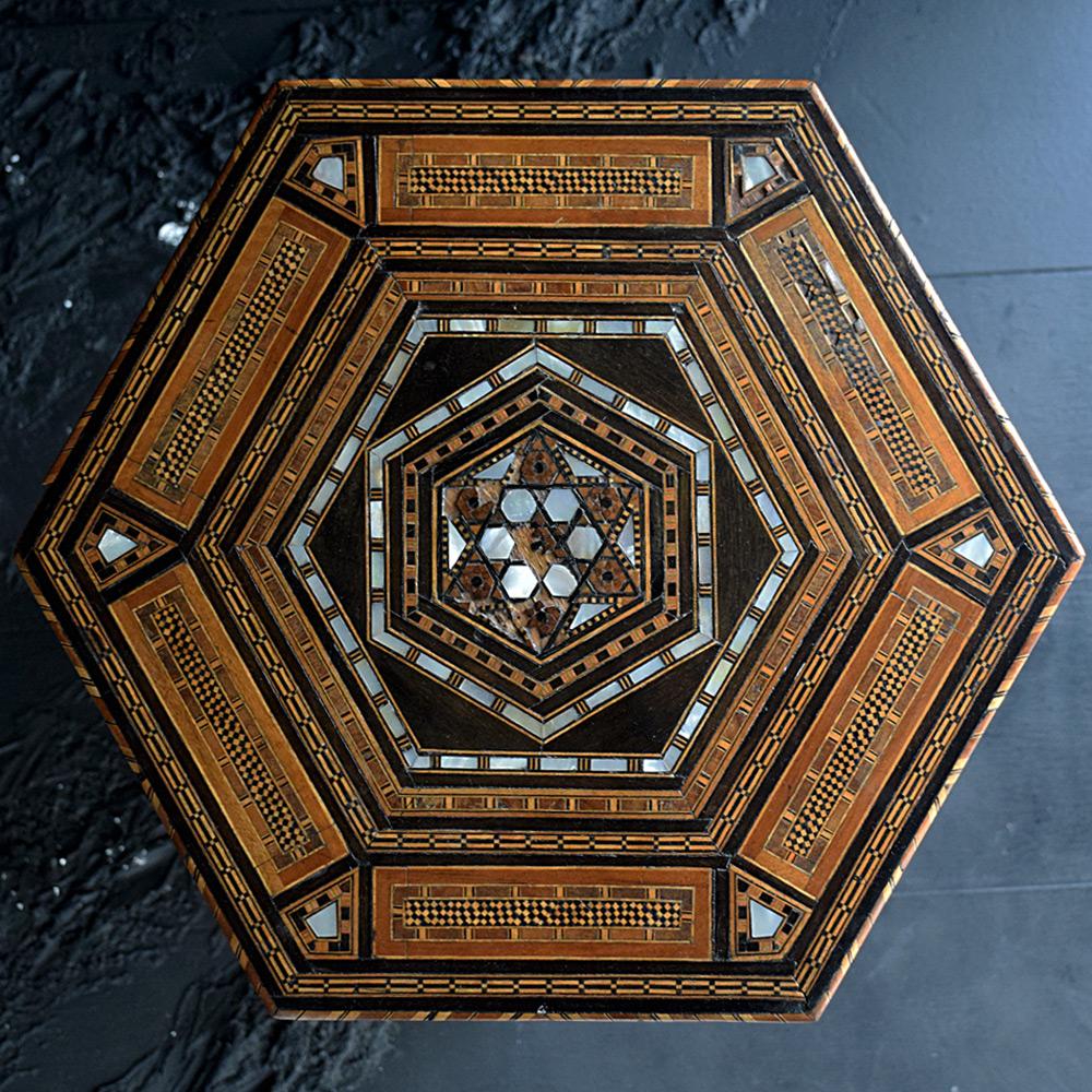 Early 20th century Syrian side table

We are proud to offer a wonderful example of a Syrian mother of pearl, bone, and parquetry inlaid hardwood octagonal side table. 

Size in inches approx.: H 21.1” x W 15.7” x D 15.7”
Period: Early 20th