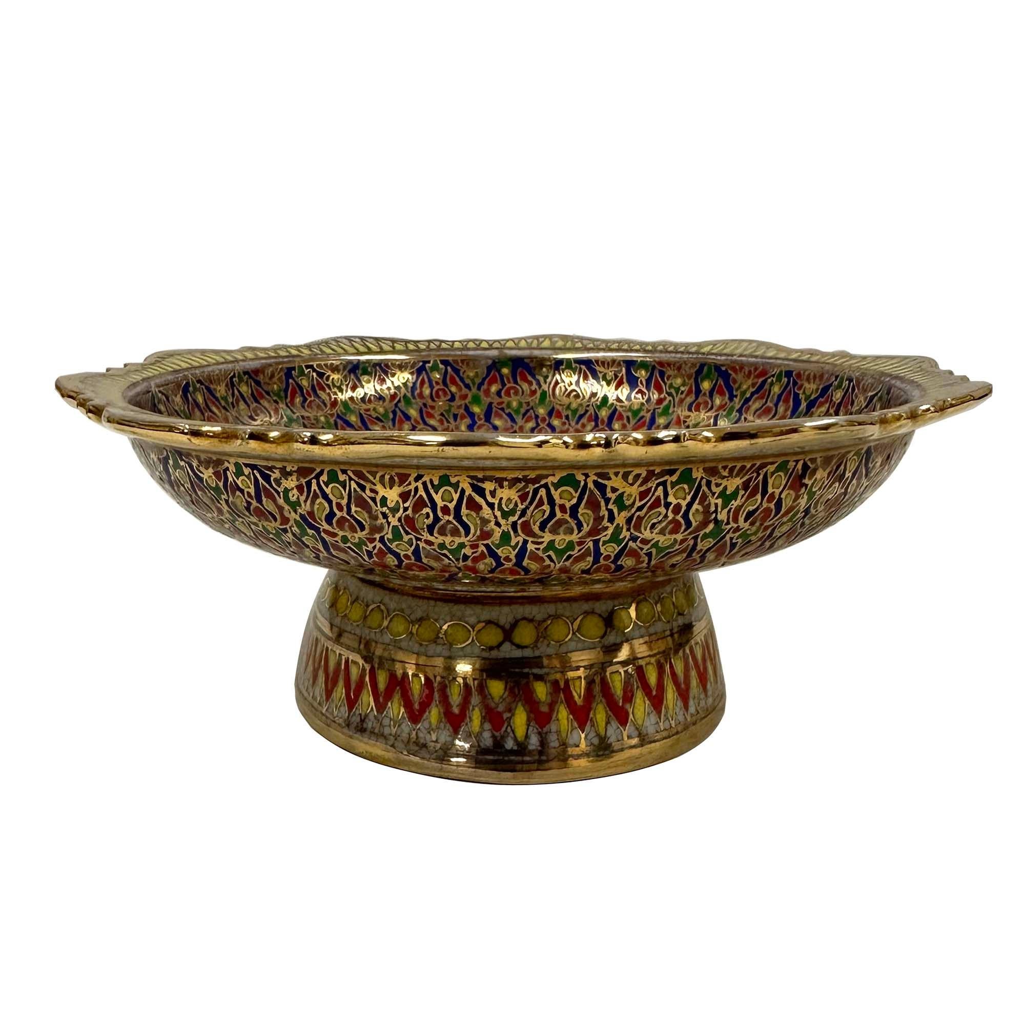 This item is a Benjarong porcelain bowl featuring a portrait of the late 19th and early 20th-century Siamese monarchs, King Chulalongkorn (Rama V) and Queen Saovabha Phongsri. 
This bowl is a piece of Thai Benjarong ware, a traditional style of Thai