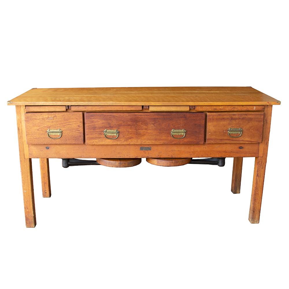 This desk was manufactured by the E.H. Sheldon company in the early 20th century. The company was founded in the late 19th century in Chicago and moved operations to Muskegon, MI in 1912. This particular desk is hallmarked with the Muskegon factory
