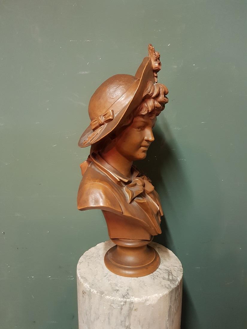 Early 20th Century Terracotta Bust of an Elegant Young Lady with a Hat For Sale 3