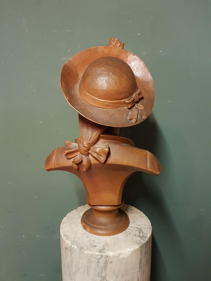 Early 20th Century Terracotta Bust of an Elegant Young Lady with a Hat For Sale 4