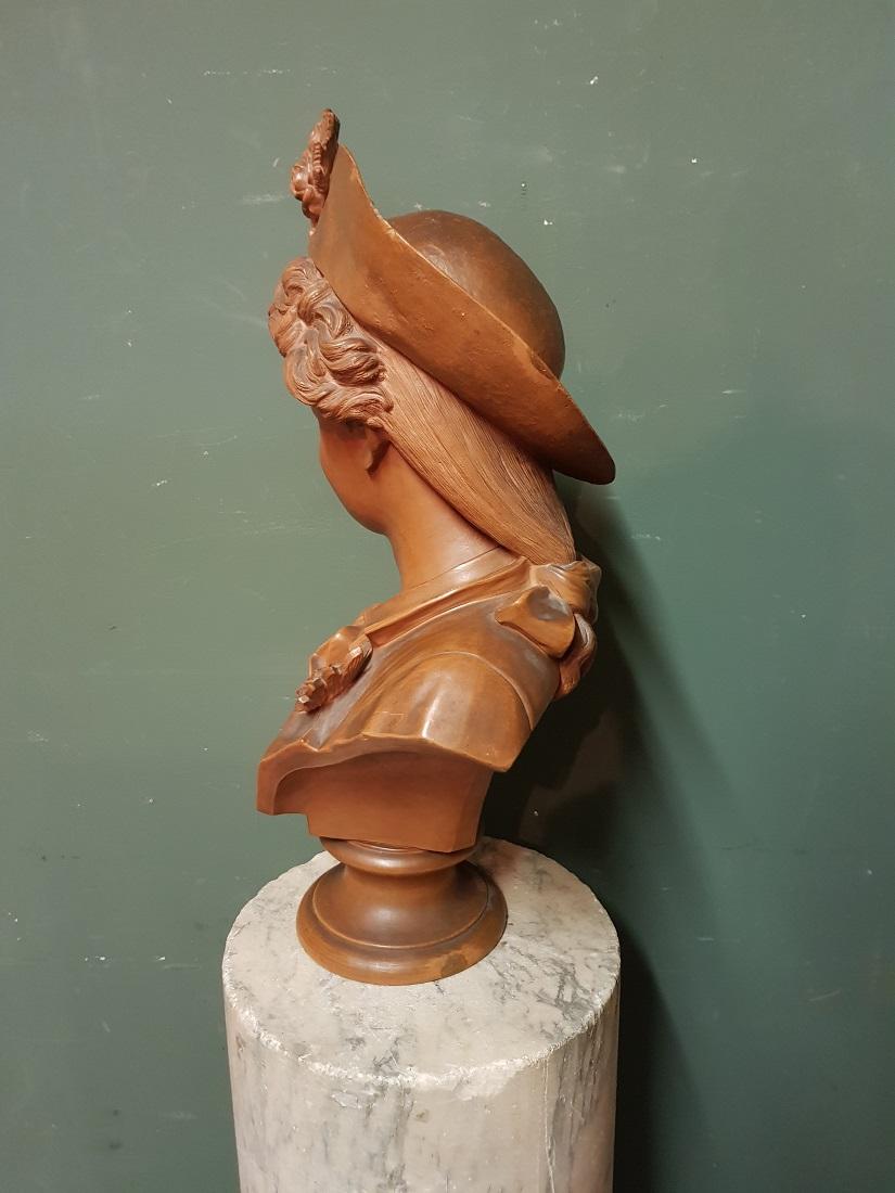Early 20th Century Terracotta Bust of an Elegant Young Lady with a Hat For Sale 5