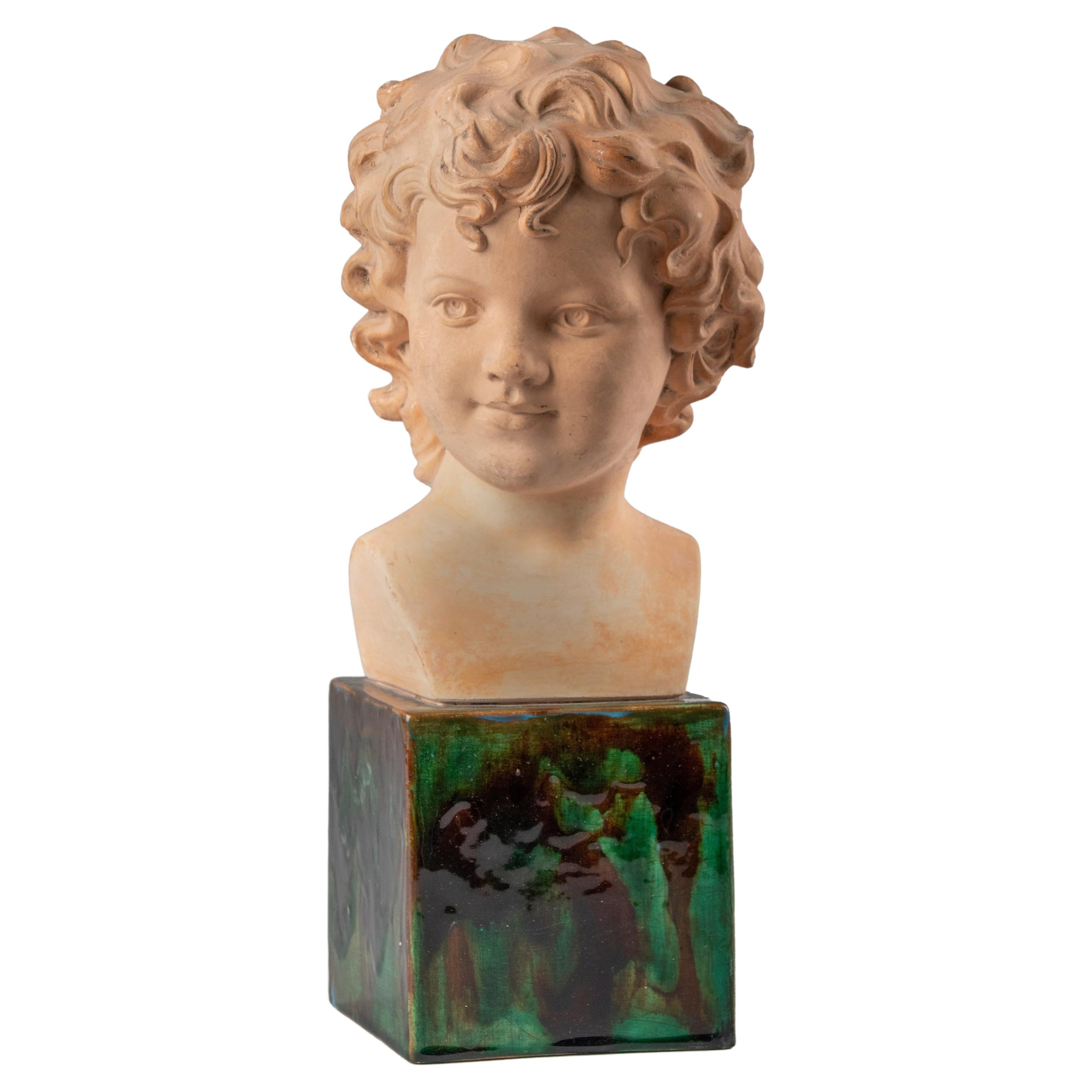 Early 20th Century Terracotta Buste Portrait of a Child Signed Mary For Sale