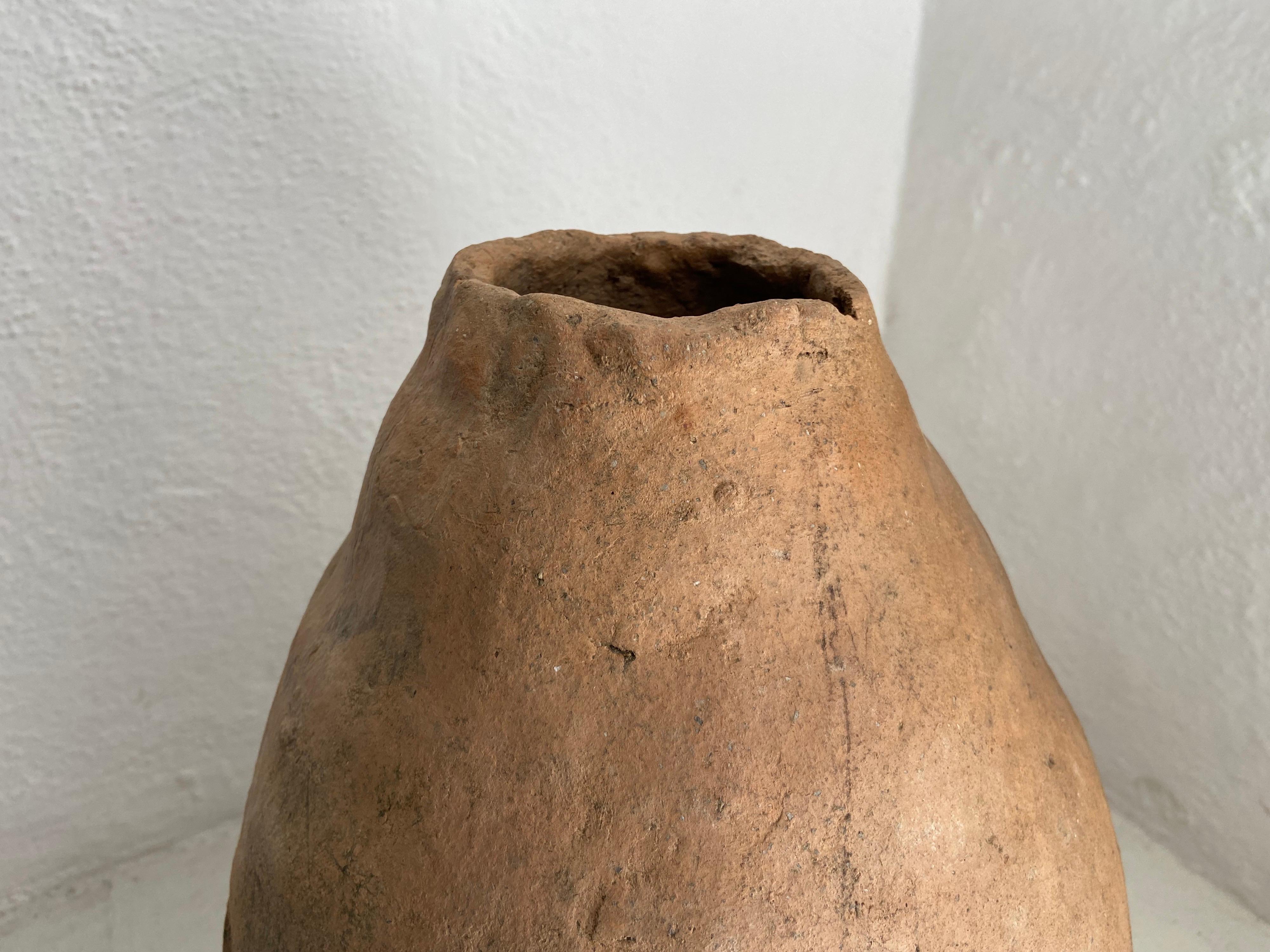 Early 20th century terracotta dome heater from Northern Puebla, Mexico. Firewood was placed inside the 