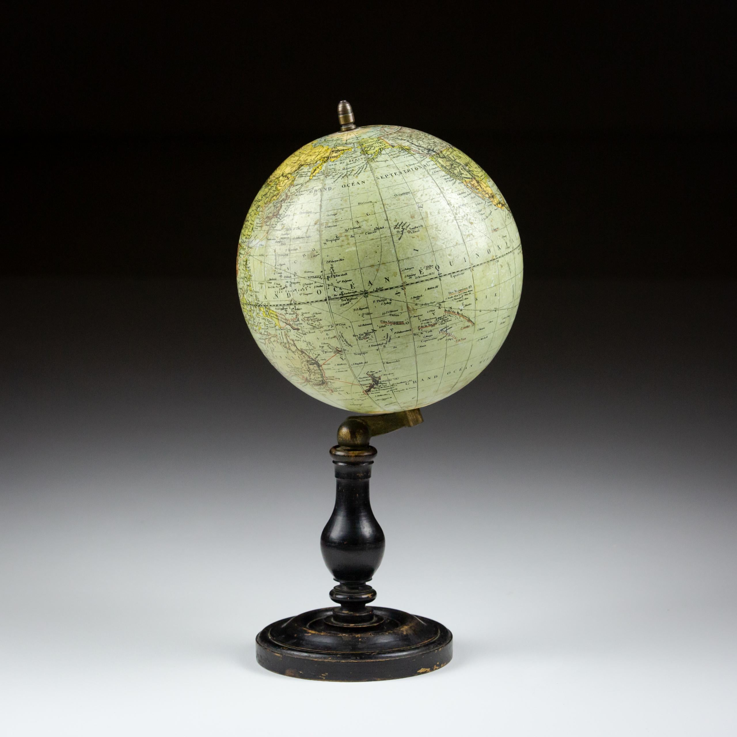 Early 20th Terrestrial Globe by G. Thomas. 44 Rue ND des Champs, Paris. Found on original ebonised turned base and brass fittings. Paris, France Circa 1920.