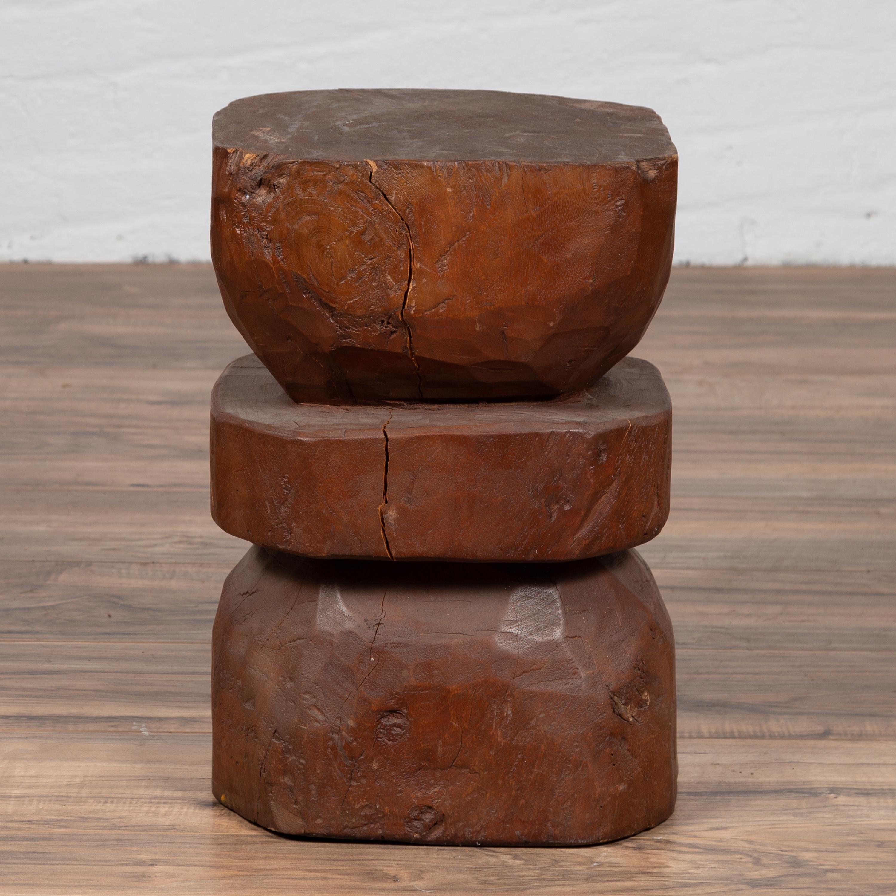 An antique Thai rustic tree stump pedestal from the early 20th century. Born in Thailand during the early years of the 20th century, this pedestal will charm you with its rustic appeal and interesting shape. Made of a tree stump roughly carved into