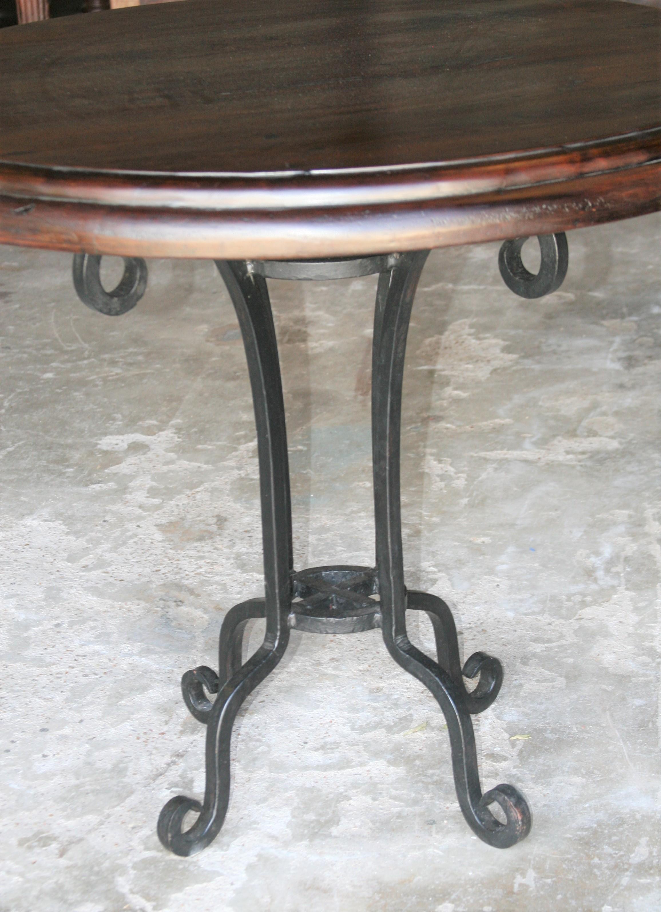 Anglo Raj Early 20th Century Thick Top Round Center Table with Hand Forged Iron Support For Sale