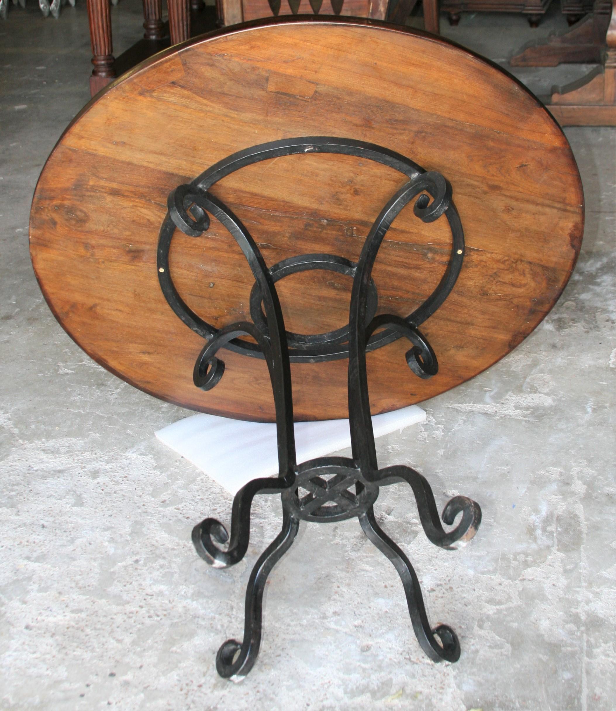Indian Early 20th Century Thick Top Round Center Table with Hand Forged Iron Support For Sale