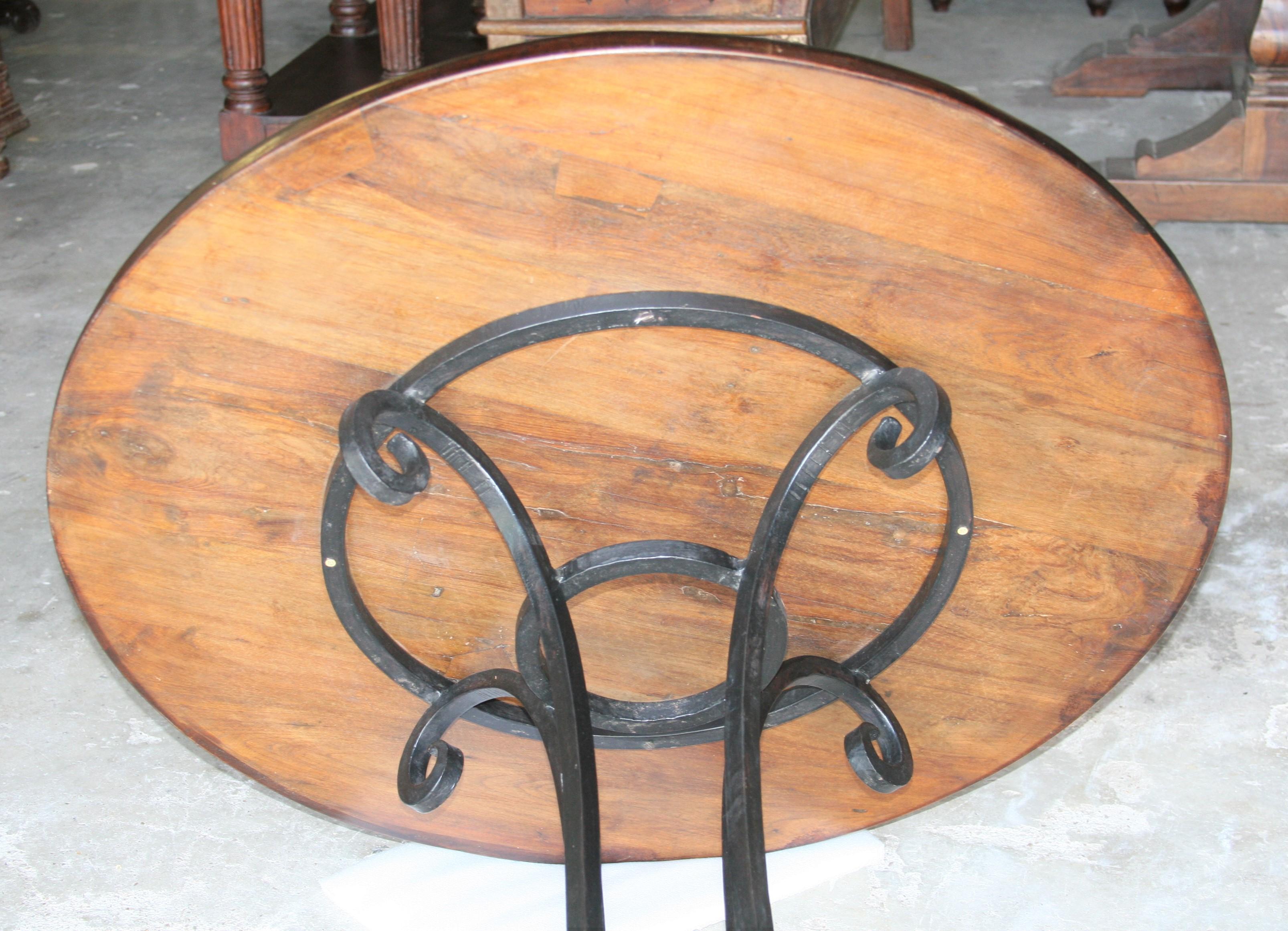 Hand-Crafted Early 20th Century Thick Top Round Center Table with Hand Forged Iron Support For Sale
