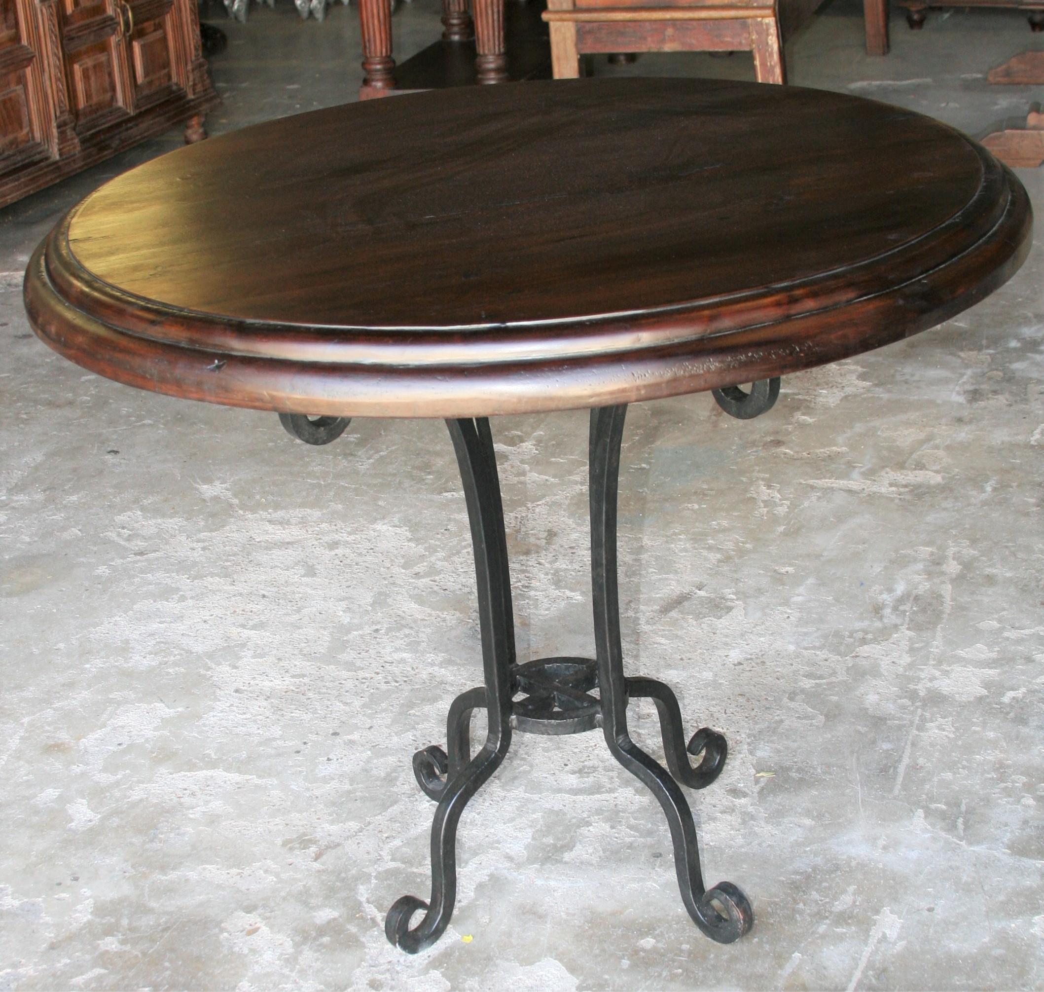 Early 20th Century Thick Top Round Center Table with Hand Forged Iron Support For Sale 1