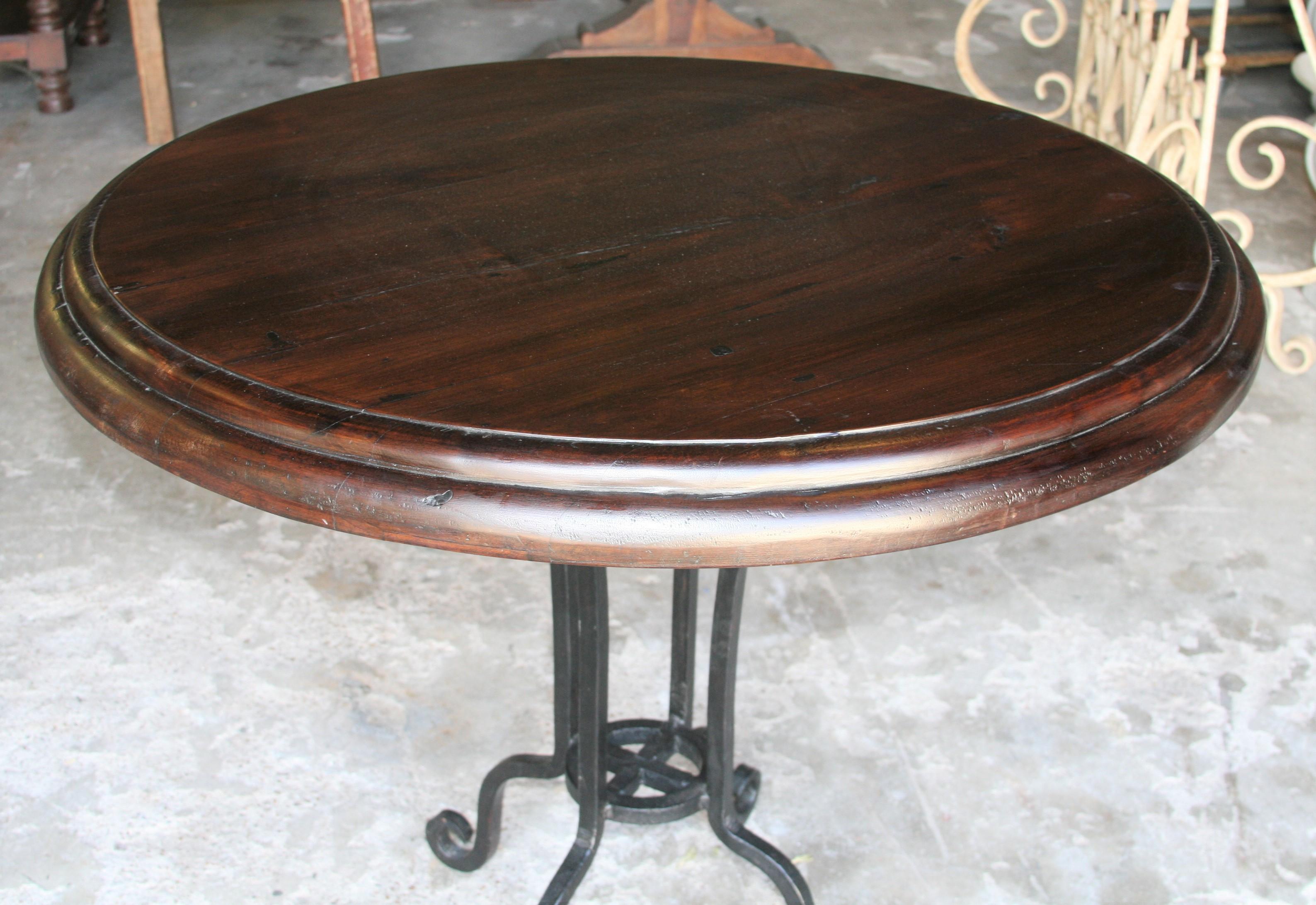 This unusual almost indestructible ceremonial table was custom made for a settler in the southern peninsula of India.
It is made of very fine solid teak wood. It is solid 2.5 inches thick all through the entire diameter. To day from the same amount