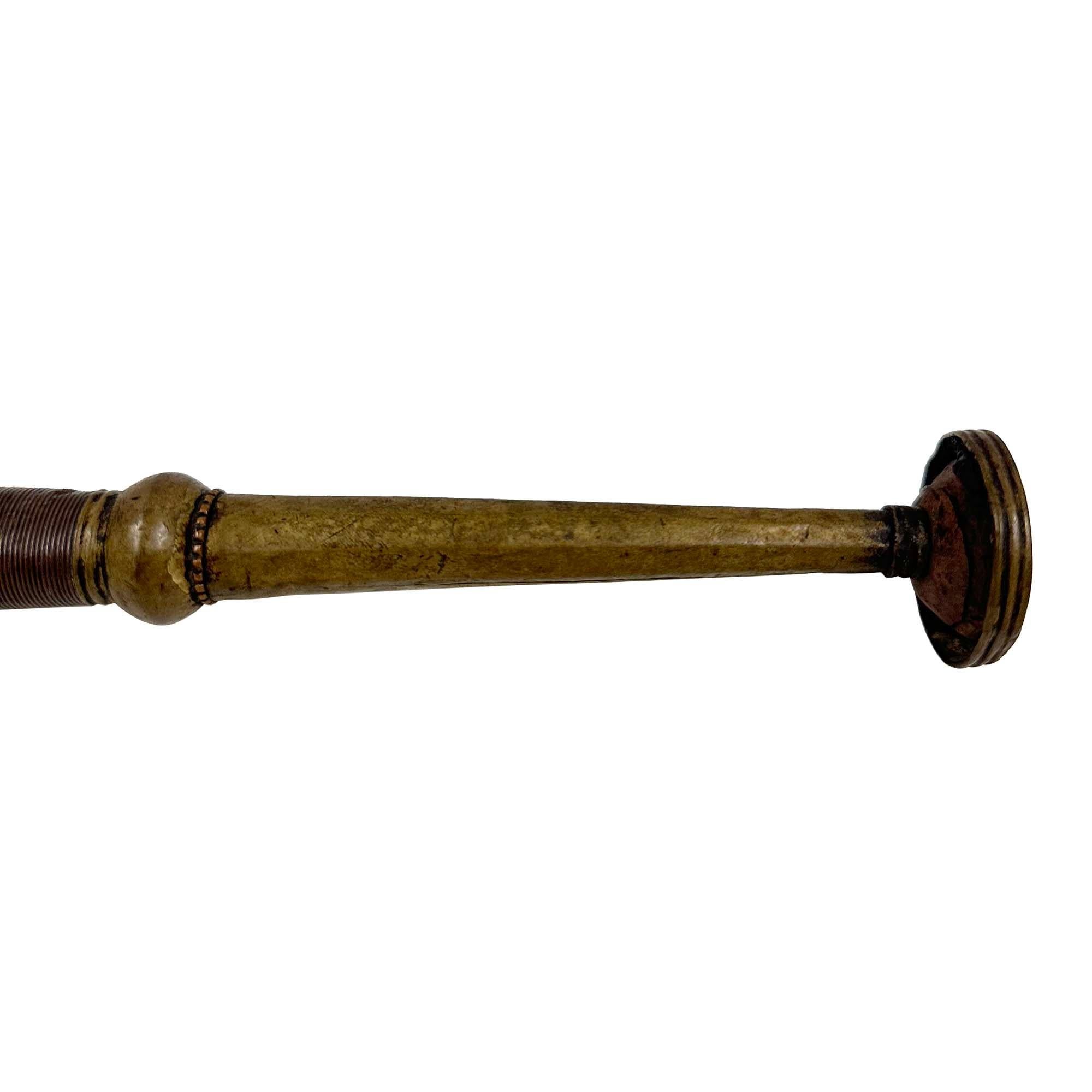 This is a beautiful antique Handcrafted Tibetan Buddhist trumpet with traditional Tibetan tassel.
The trumpet is used for religious ceremonies where it is blown along with other big horn trumpets called dungchens, cymbals and gongs to alert the