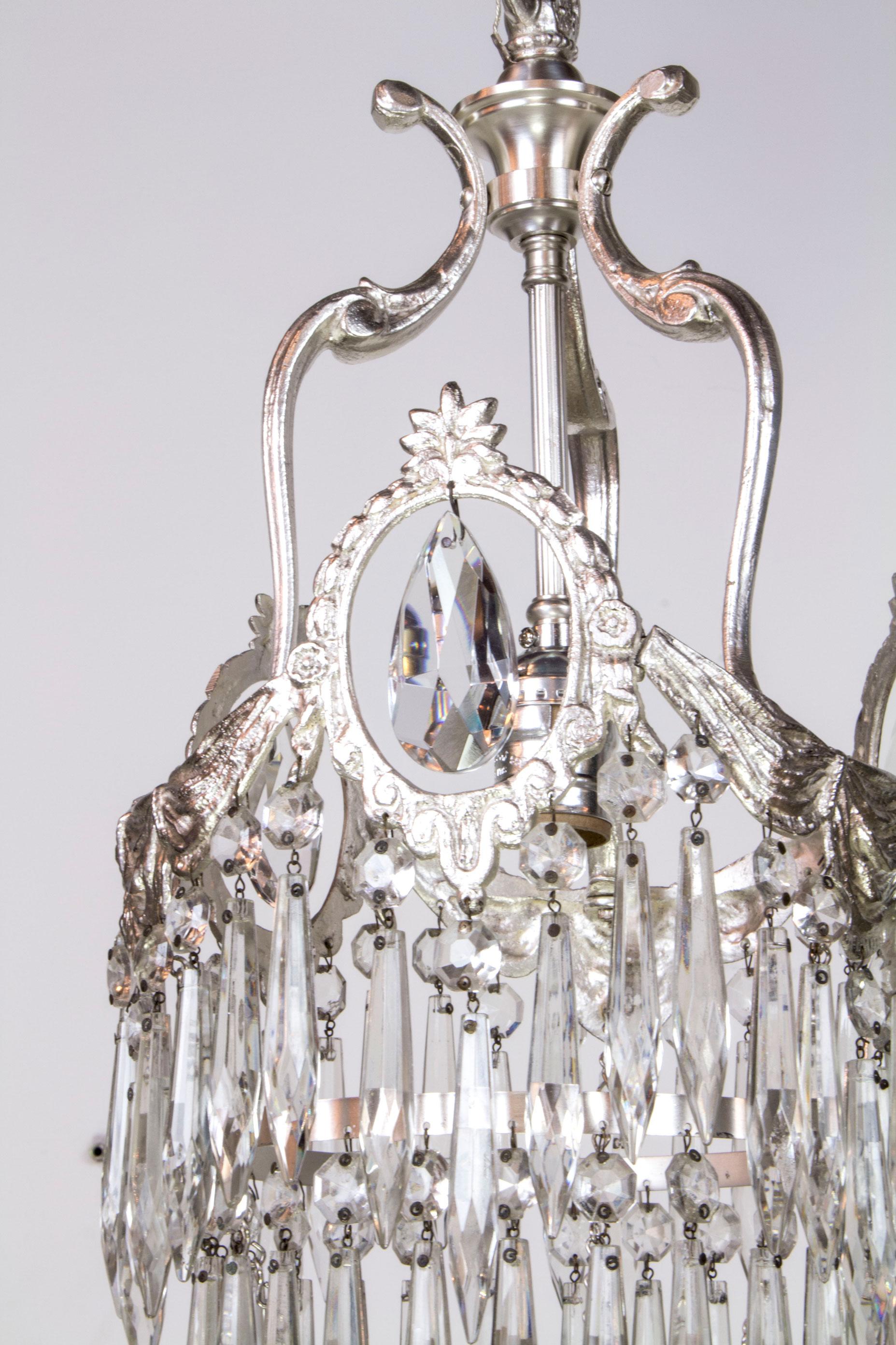 Hollywood Regency Early 20th Century Tiered Silver and Crystal Pendants, a Pair