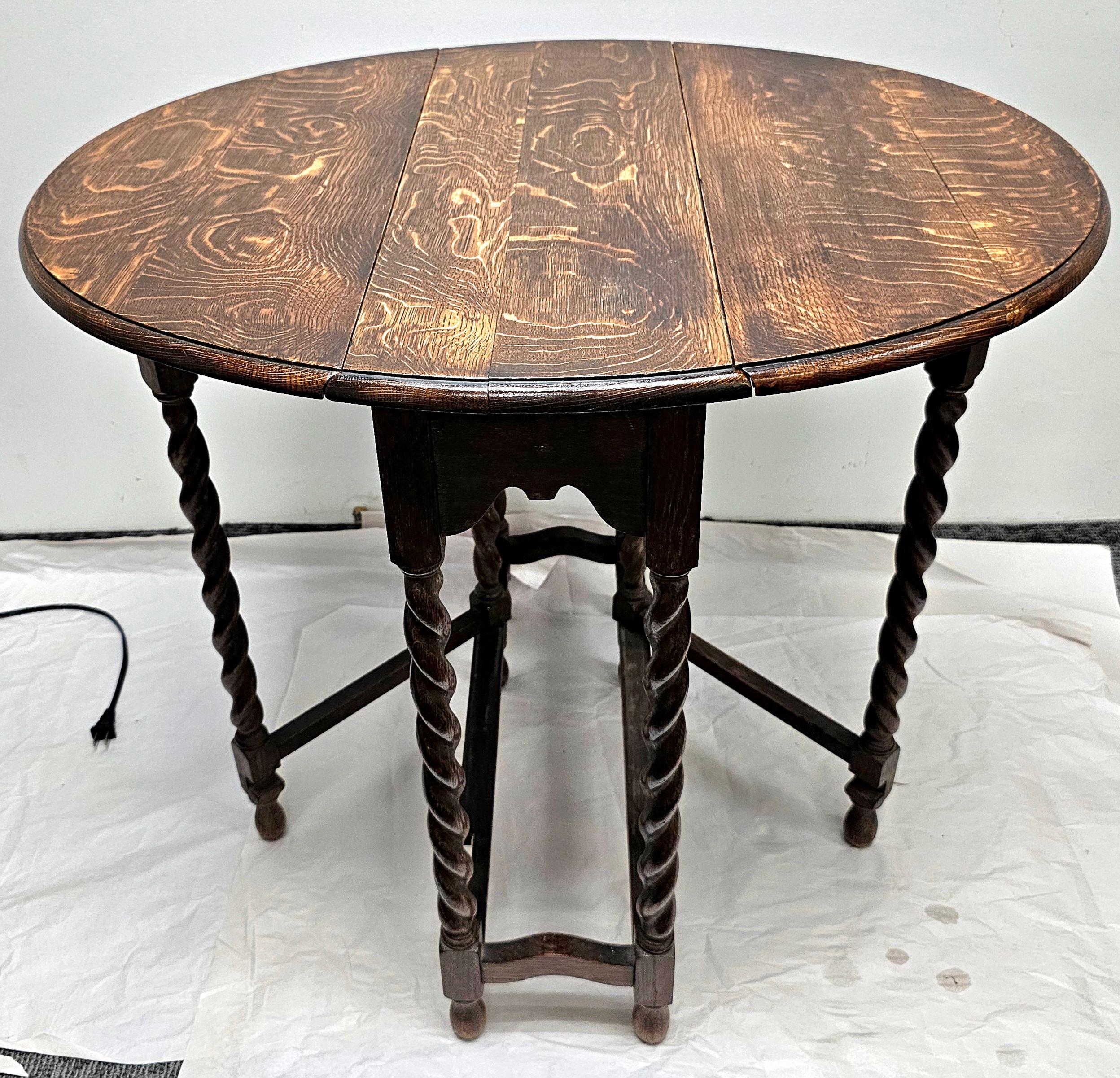 American Colonial Early 20th Century Tiger Oak Barley Twist Gateleg Dropleaf Oval Side Table For Sale