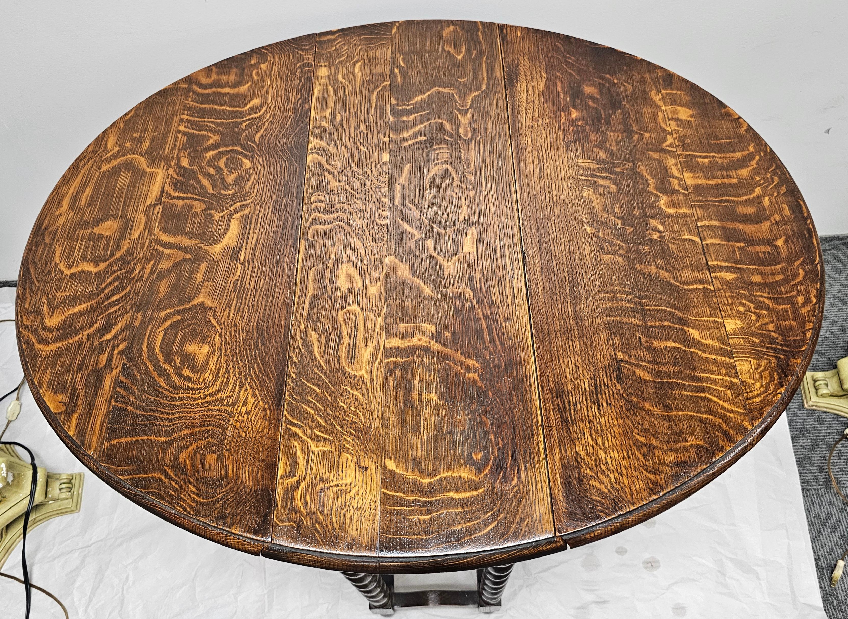 Early 20th Century Tiger Oak Barley Twist Gateleg Dropleaf Oval Side Table In Good Condition For Sale In Germantown, MD