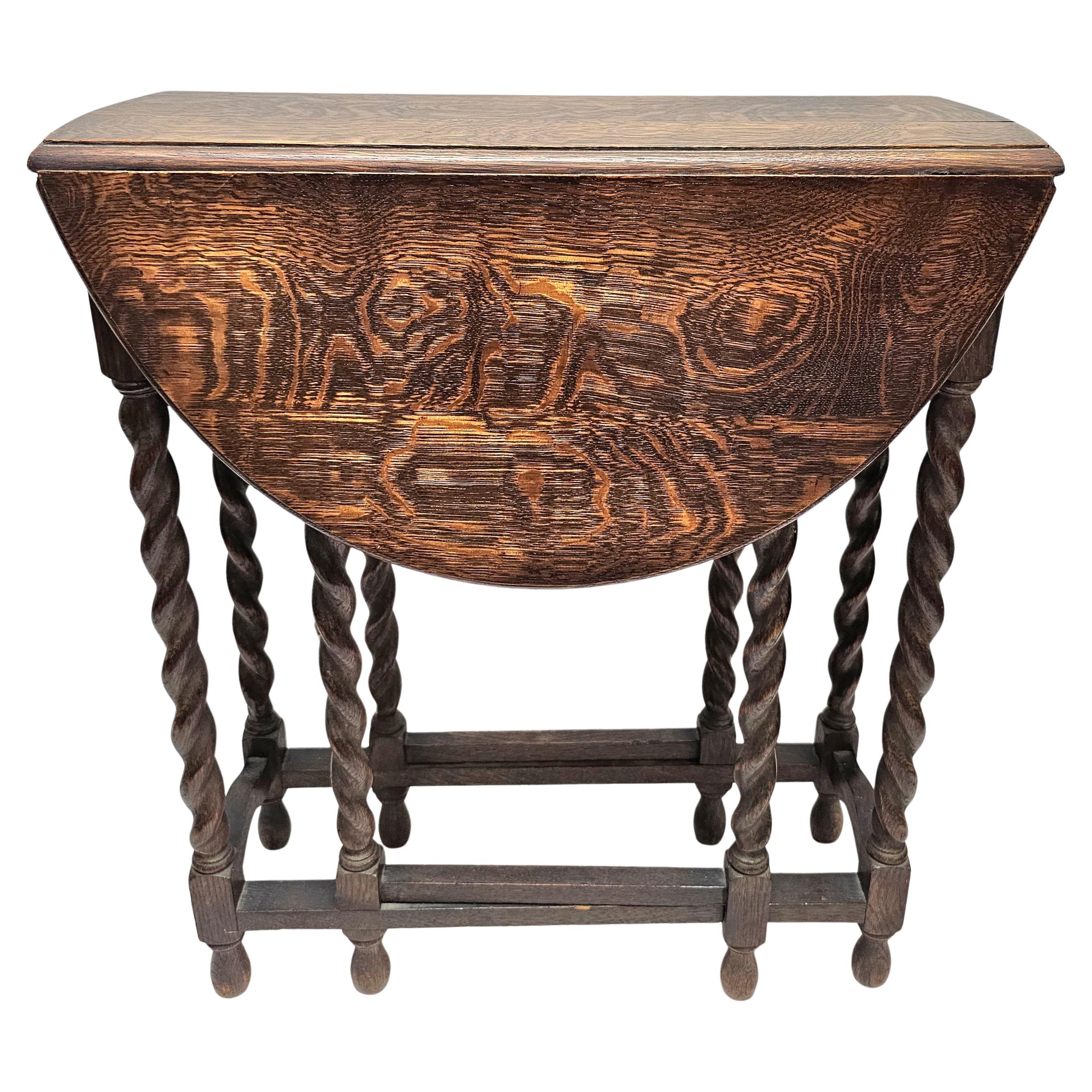 Early 20th Century Tiger Oak Barley Twist Gateleg Dropleaf Oval Side Table For Sale