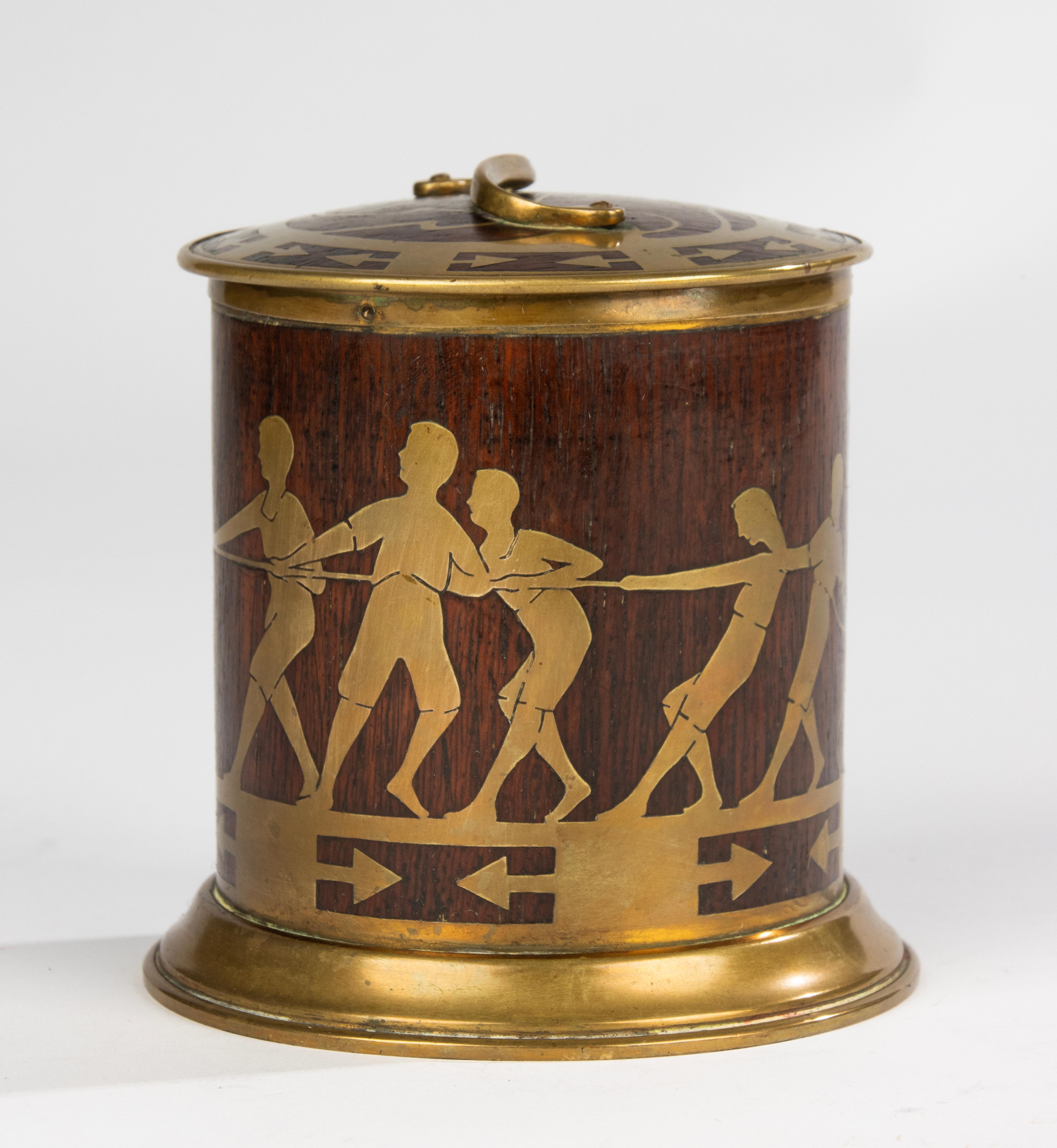 Arts and Crafts Early 20th Century Tobacco Jar - Erhard & Söhne - Brass and Wood - Tug-of-War For Sale