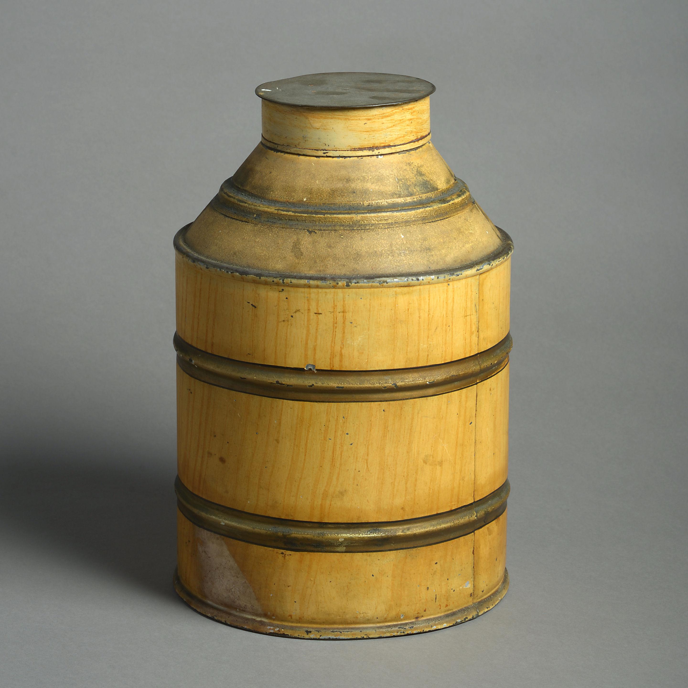 An early 20th century tole tea urn, the ringed body painted to simulate figured pine.
 
