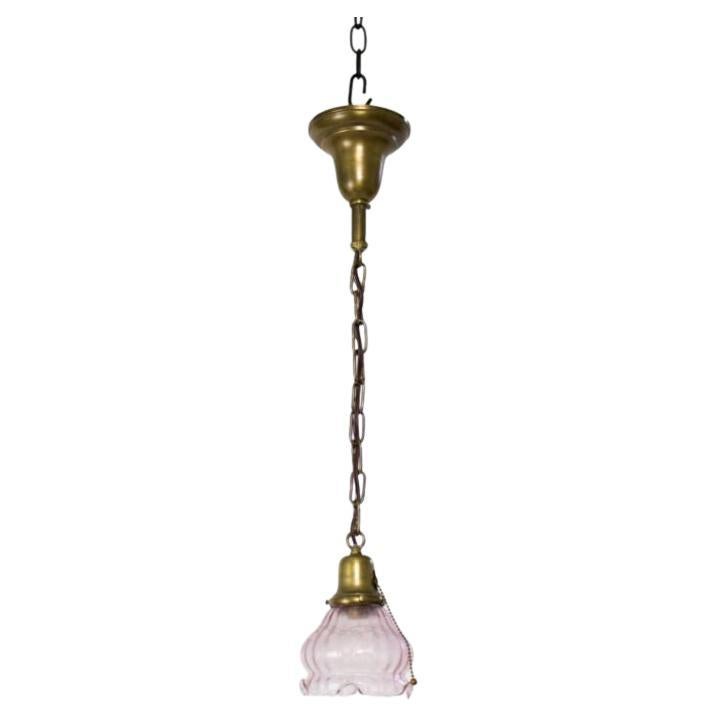 Early 20th Century Traditional Brass Pendant with Pink Vianne Glass For Sale