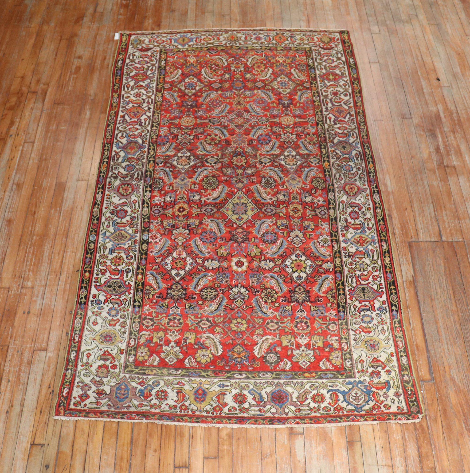 An intermediate size colorful Persian Malayer rug from the early 20th century.

Measures: 4'11