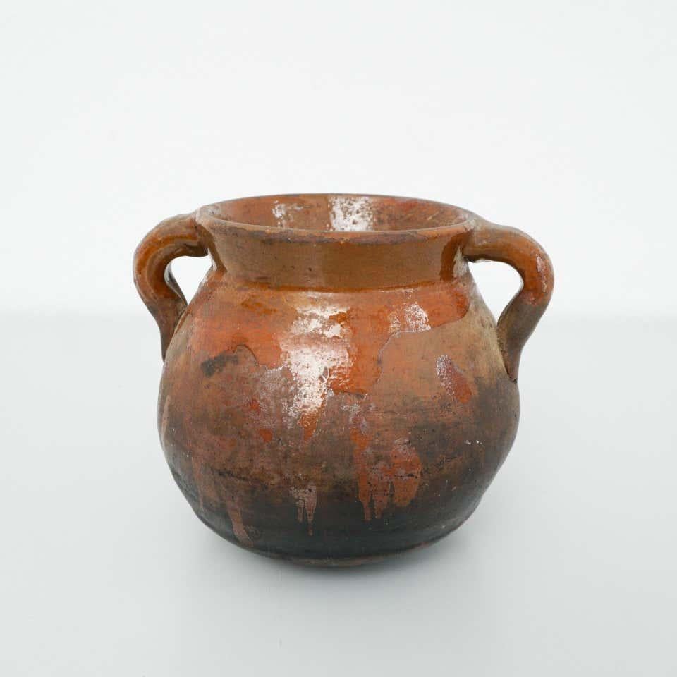 Early 20th century traditional Spanish ceramic vase    In original condition with minor wear consisitent of age and use, preserving a beautiful patina.