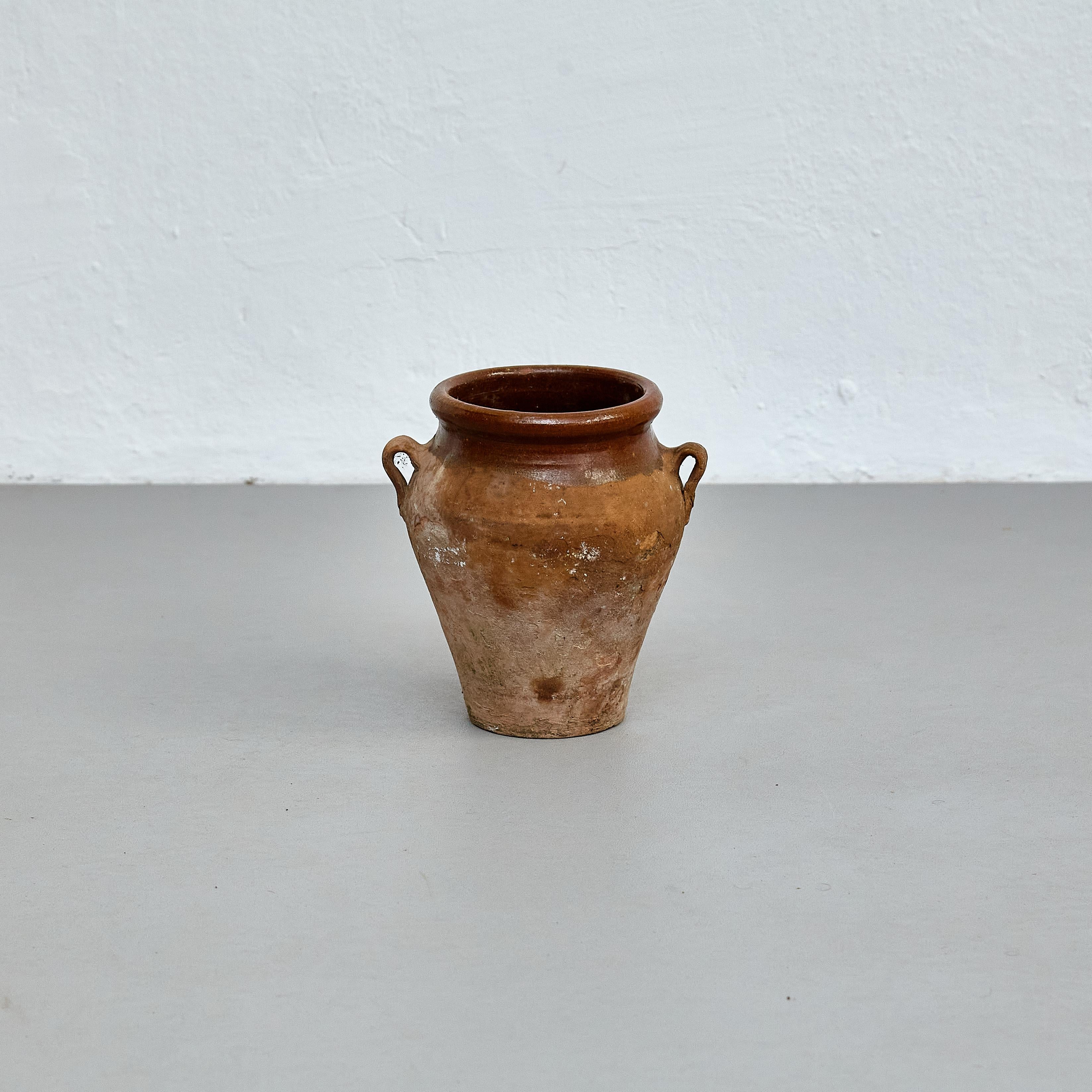 Early 20th century traditional Spanish ceramic vase.

Manufactured in Spain, early 20th century.

In original condition with minor wear consistent of age and use, preserving a beautiful patina.

Materials: 
Ceramic

Dimensions: 
Diam 19.5