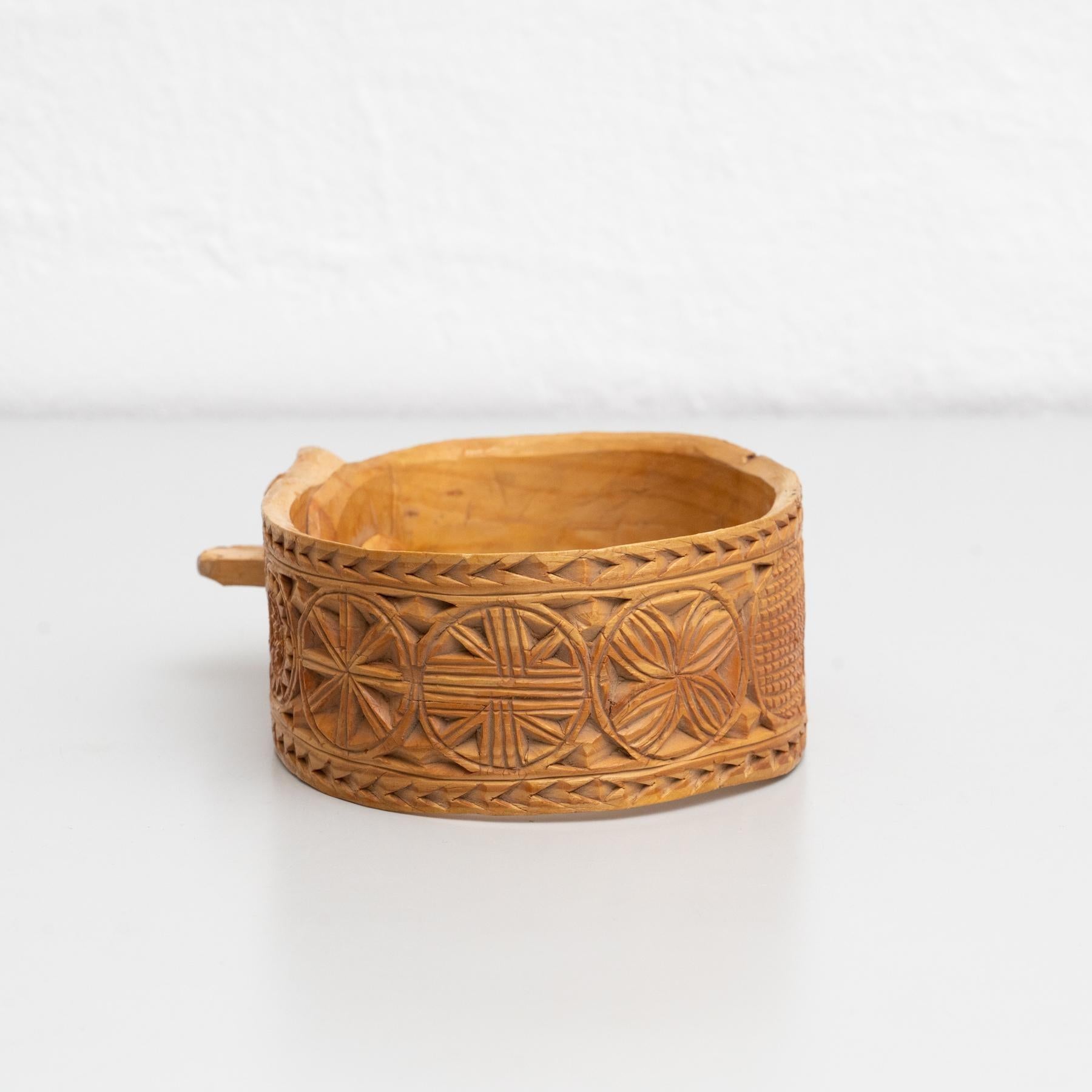Spanish Early 20th Century Traditional Wooden Pastoral Primitive Carved Cowbell Support For Sale