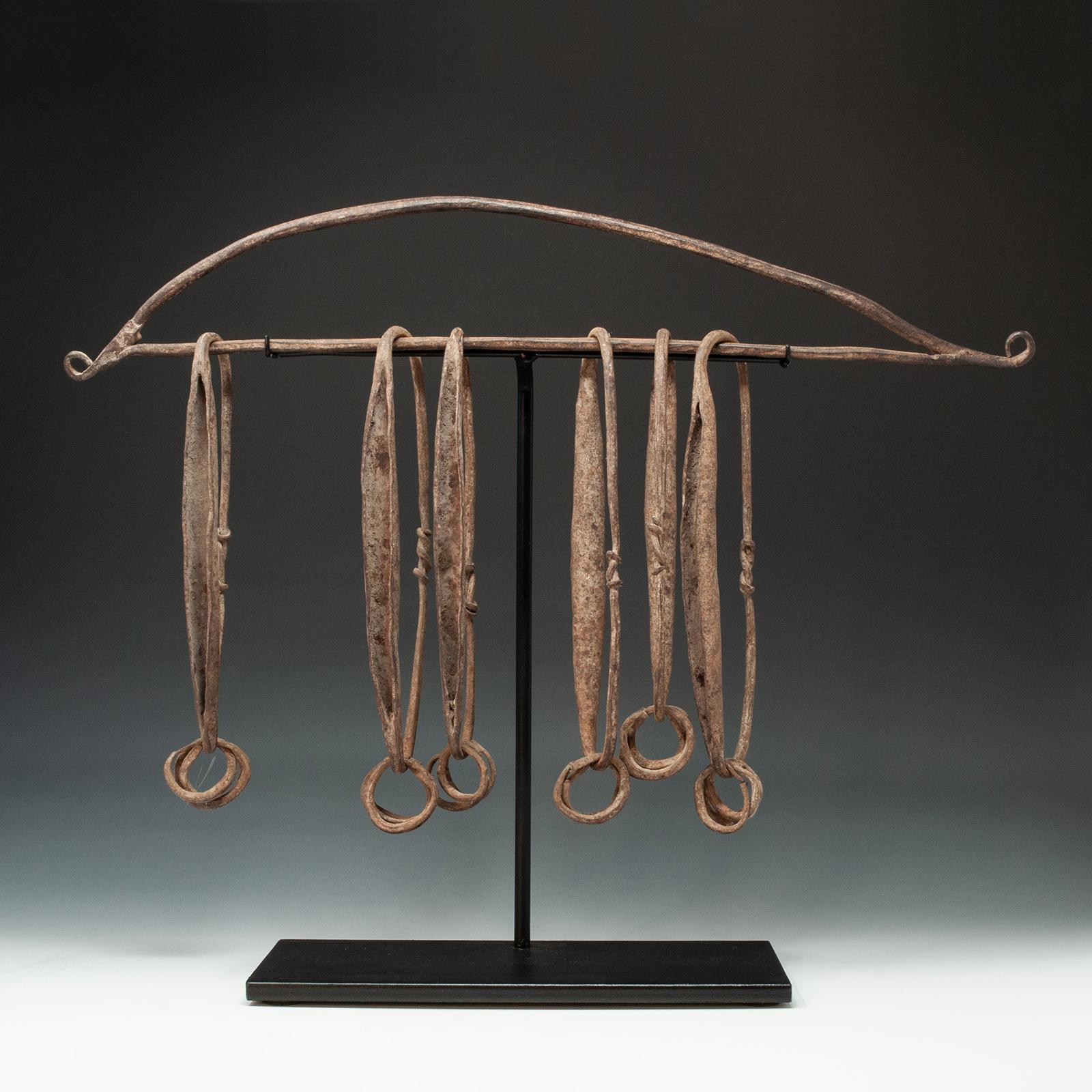 Forged iron currency, Chamba people, Northeastern Nigeria

A piece of traditional currency used for barter or exchange, it measures 15 inches (38 cm) high by 18 inches (45.7 cm) wide, as based, which is included with purchase.


