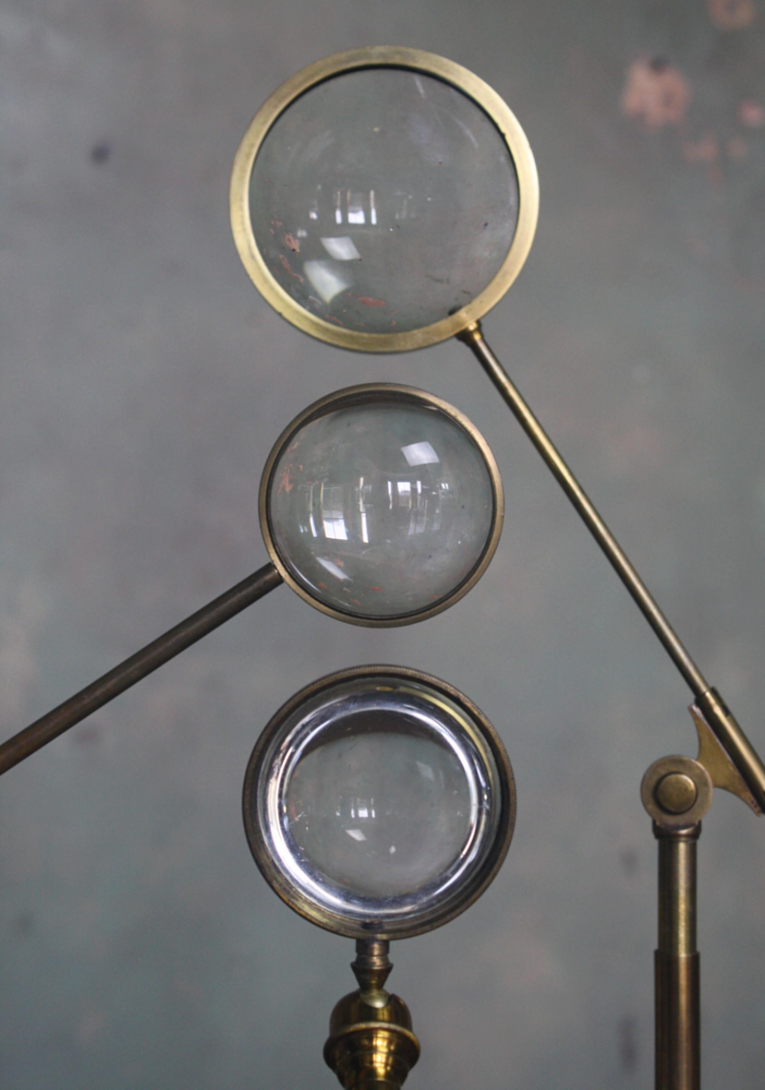 English Early 20th Century Trio of Large Brass Adjustable Table Top Condensing Lenses