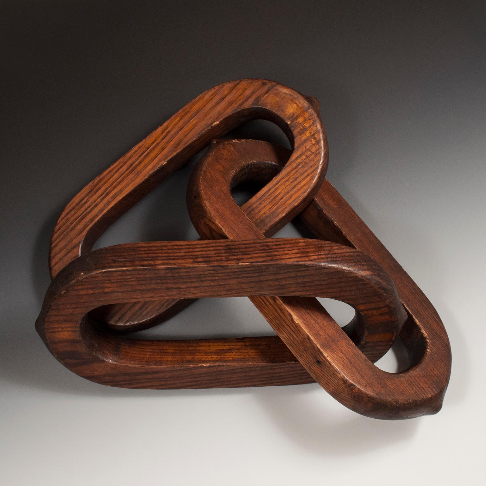 Early 20th century triple link sign from odd fellows lodge, Indiana

These three chain links are unusually large and are carved from one piece of ash, stained brown. They were collected from an Odd Fellows lodge in Indiana and symbolize the